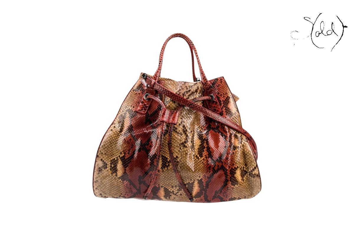 Bottega Veneta python bag on Sold Attire blog canvas.