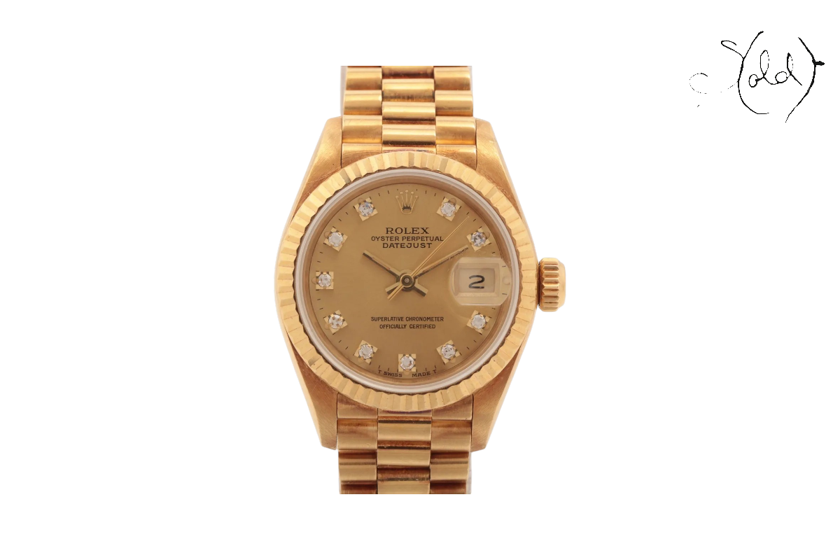 Rolex Datejust gold watch on Sold Attire blog canvas.
