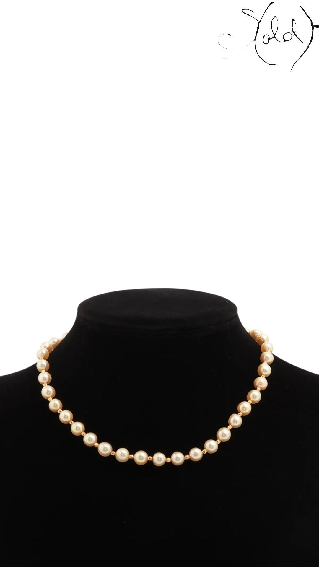 Sold Attire cream Akoya pearl necklace displayed on a black mannequin bust featuring a classic round pearl design.