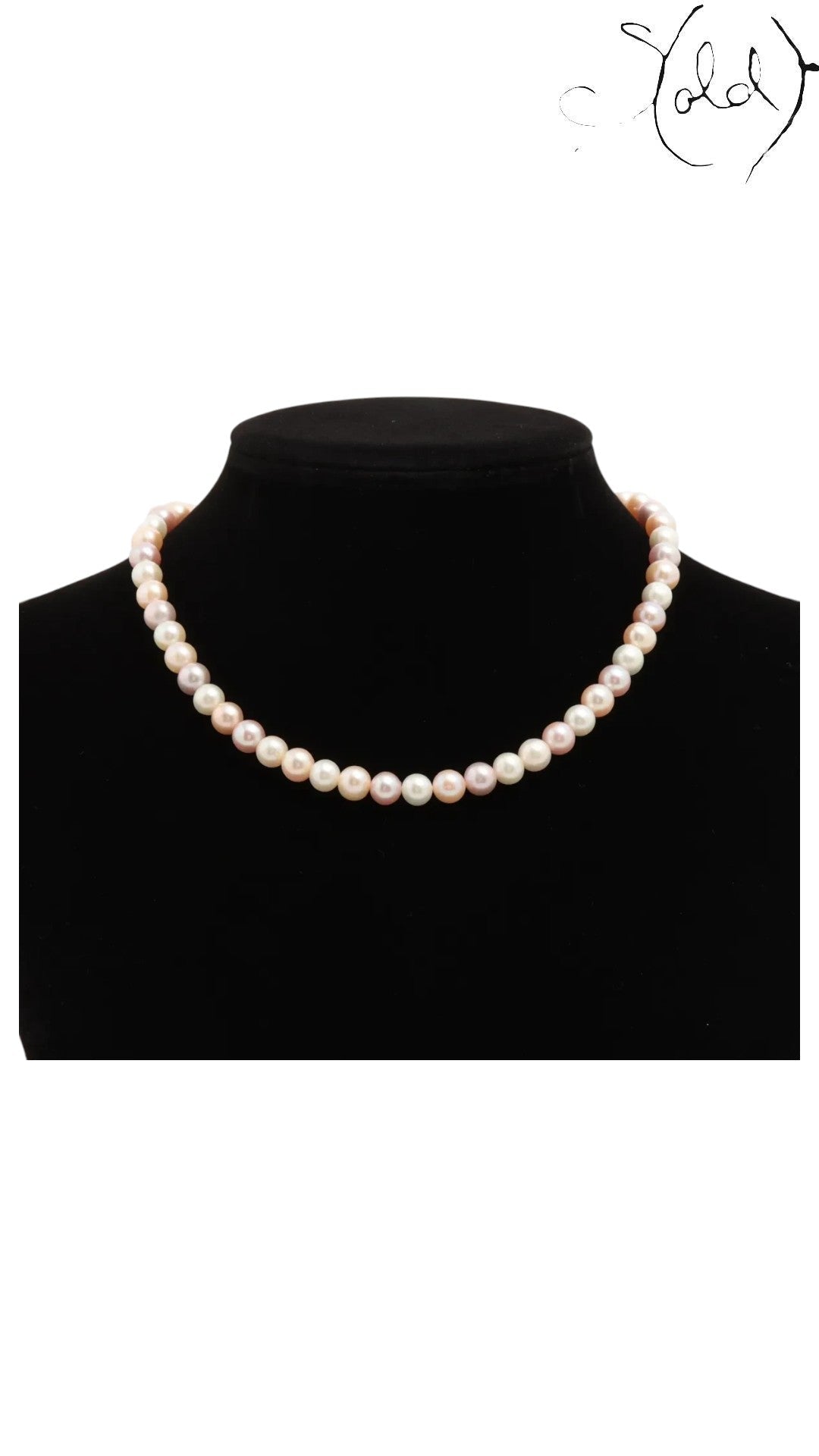 Sold Attire pink and peach Akoya pearl necklace with an SV925 silver clasp on a black display bust.