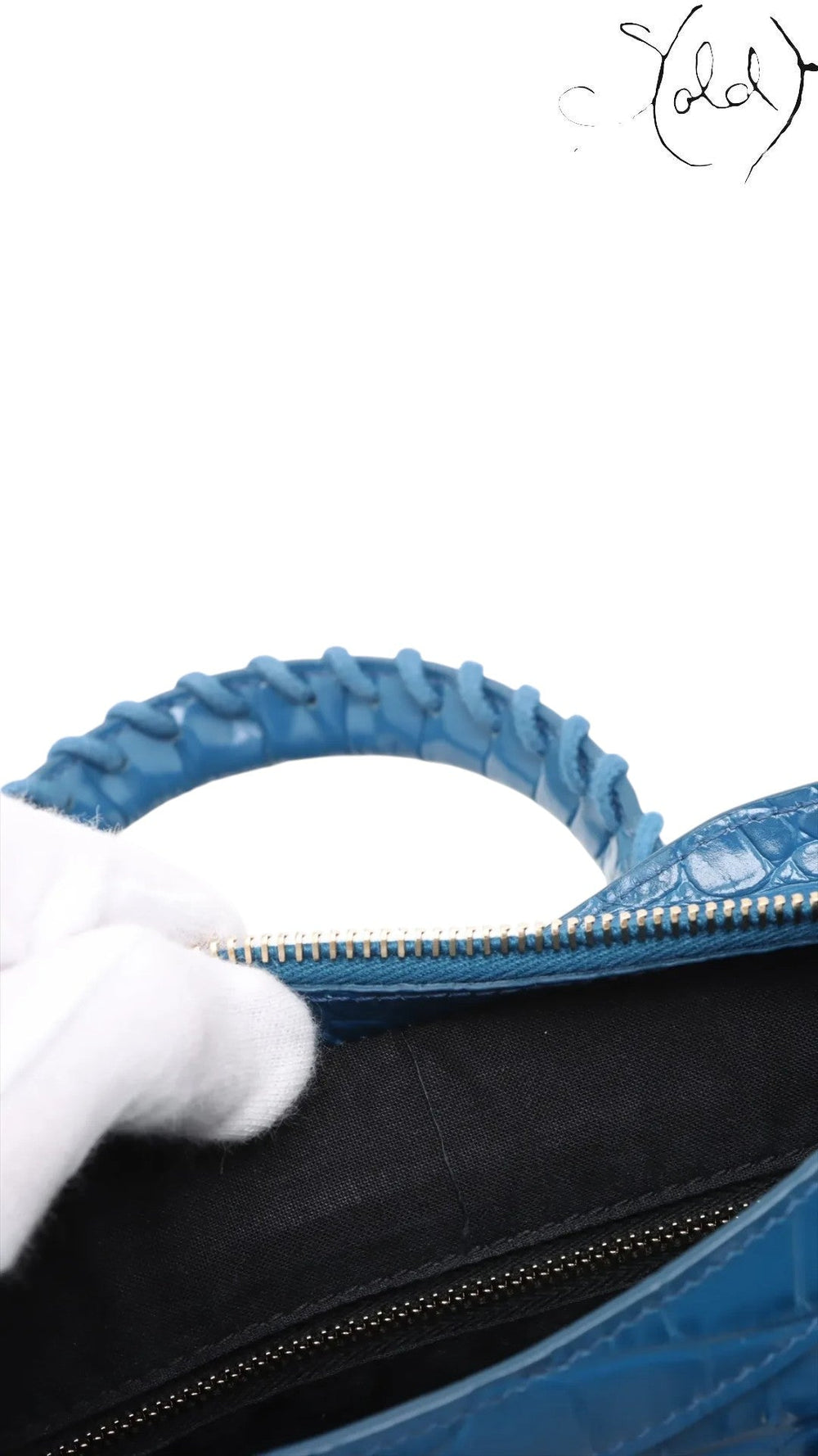 Sold Attire Balenciaga City bag in Bleu Marine crocodile-embossed calfskin showing the black fabric interior lining