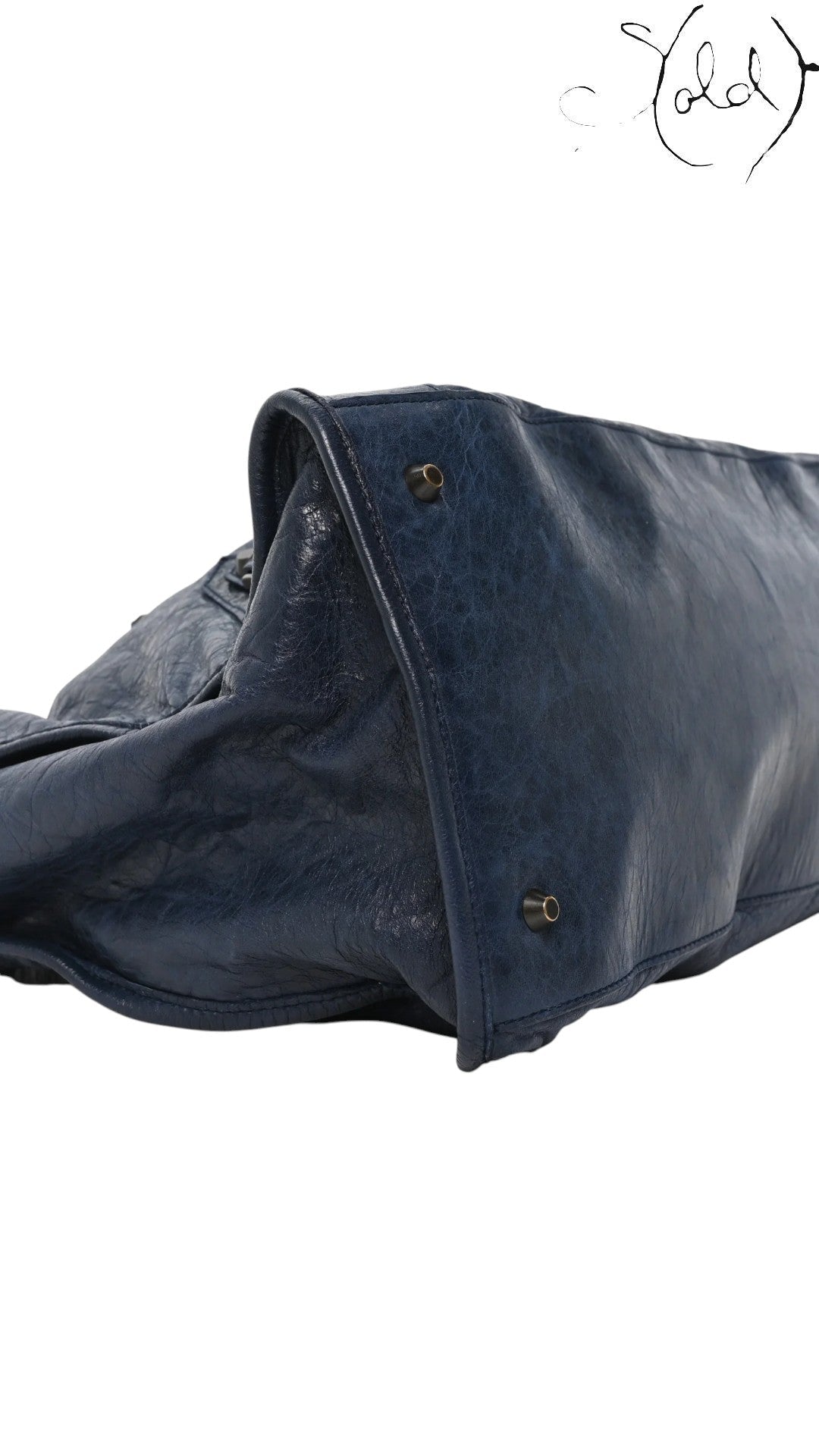 Sold Attire navy blue lambskin Balenciaga Classic Hardware Work bag with aged brass hardware and rolled handles.