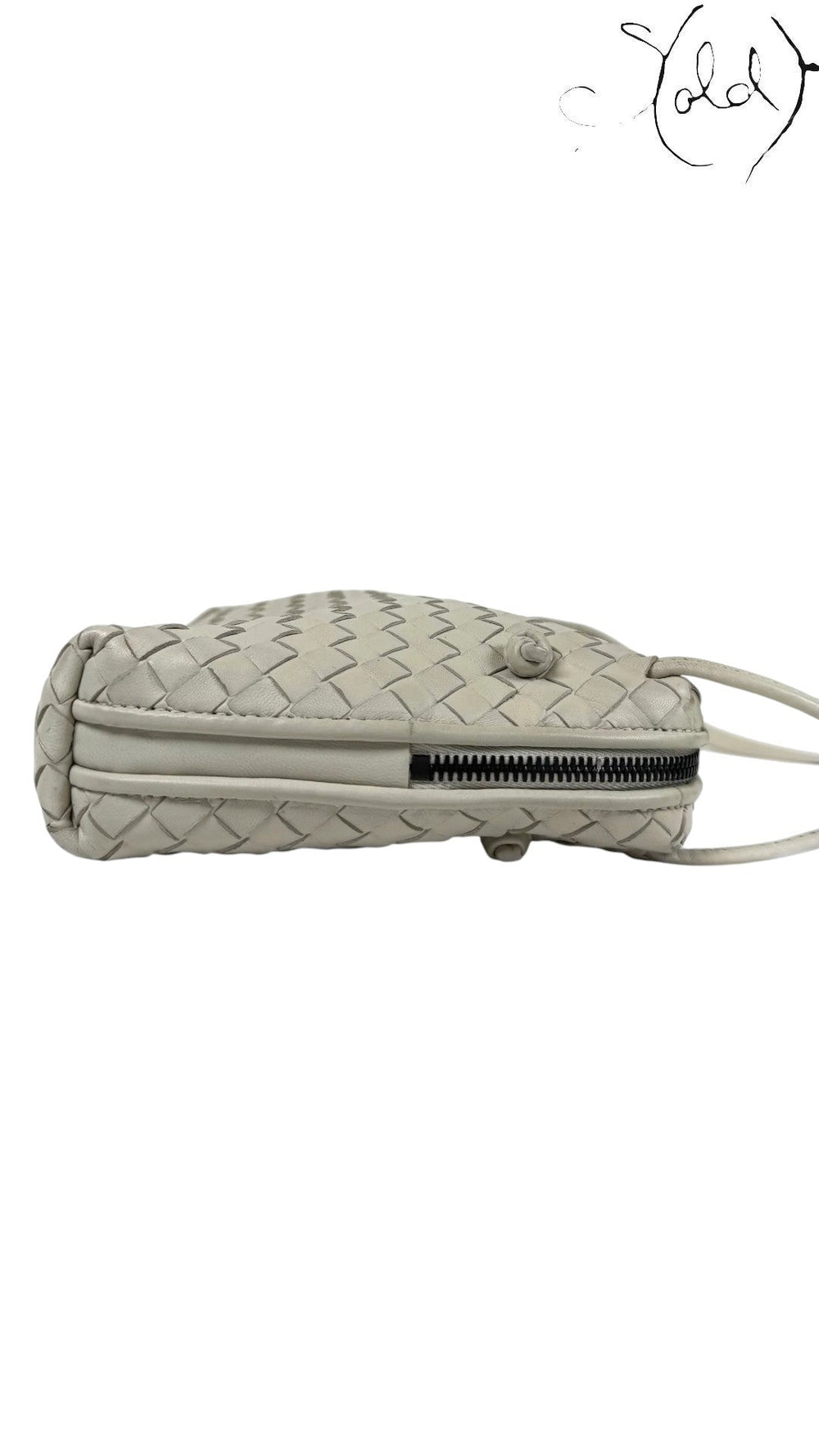 Sold Attire taupe nappa leather Bottega Veneta Nodini crossbody bag with signature Intrecciato weave and dark gunmetal zipper.