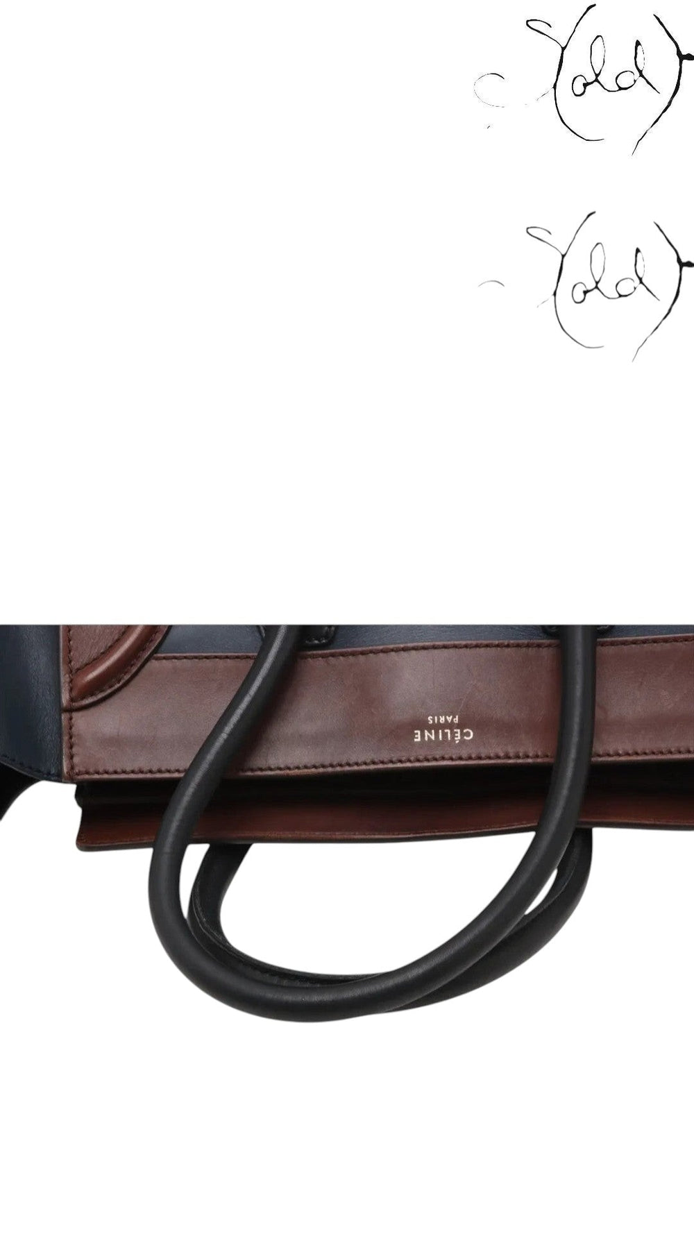 Sold Attire pre-owned Celine Luggage Mini Shopper in navy and brown leather with rolled handles and gold logo stamp.