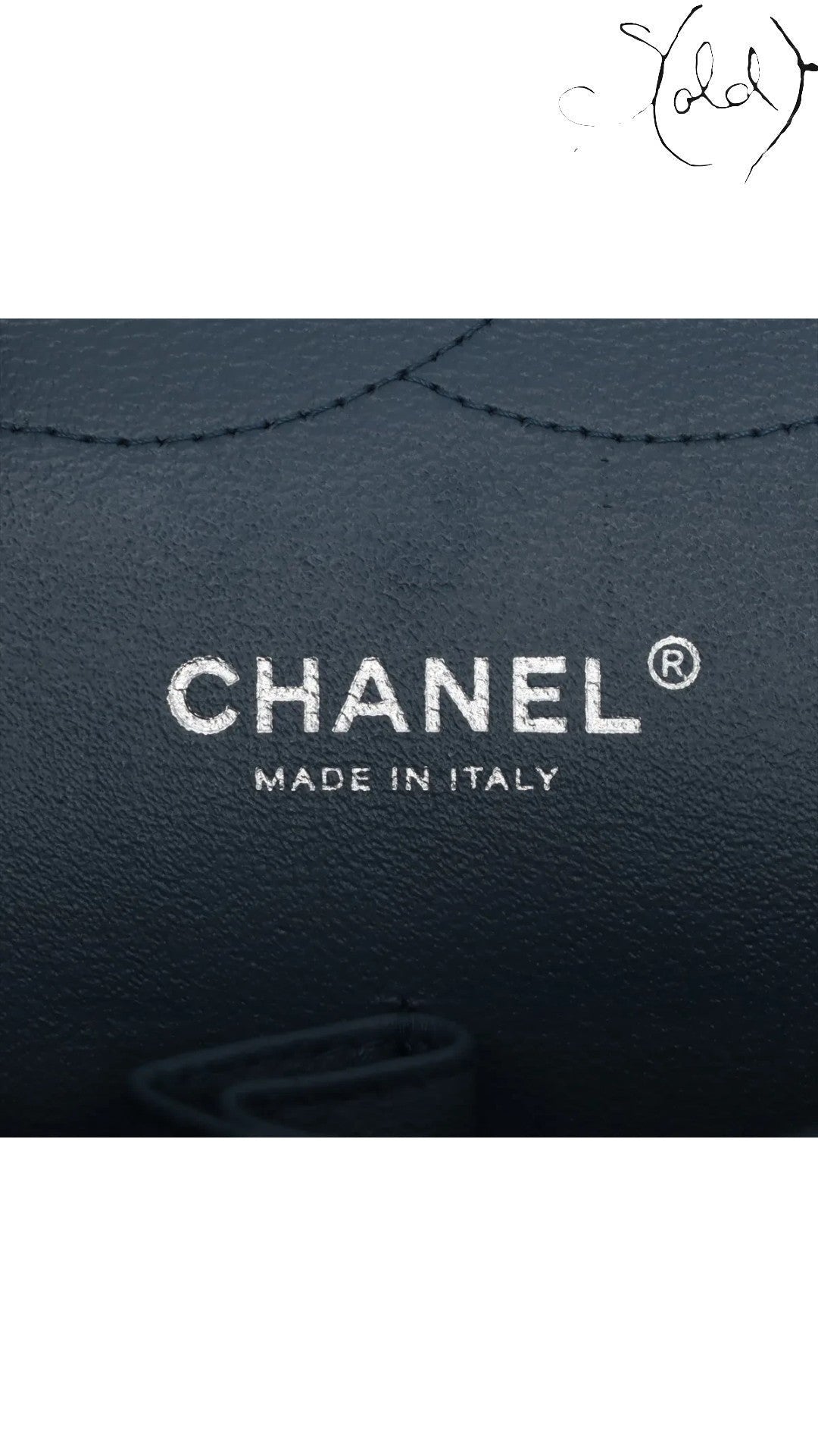 Sold Attire blue lambskin Chanel Deca Matelasse 30 Large Double Flap bag interior detail showing logo.