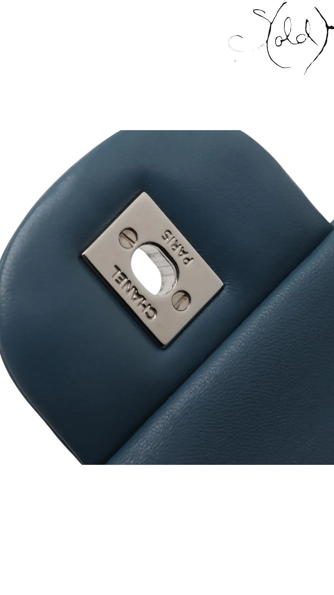 Sold Attire blue lambskin Chanel Deca Matelasse 30 double flap bag with silver-tone CC turnlock closure.