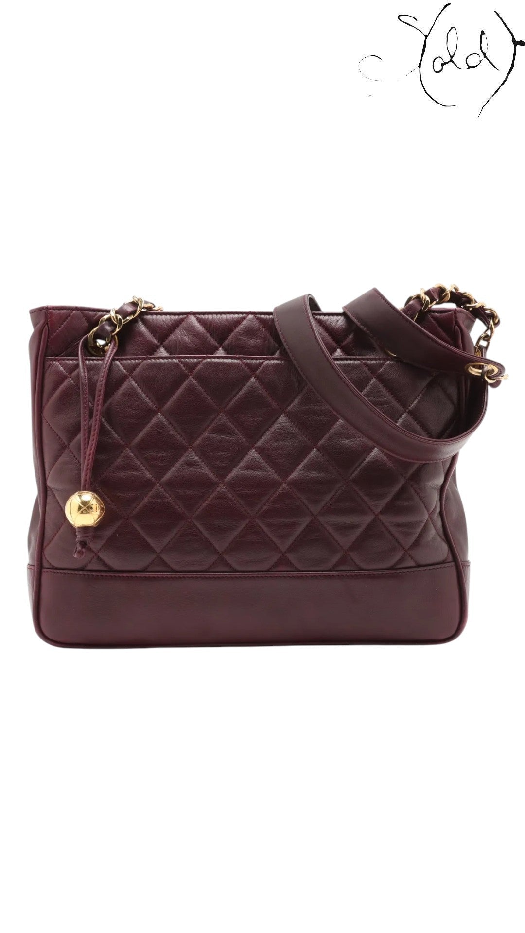 Sold Attire bordeaux lambskin Chanel Matelasse Chain Tote with gold hardware and Coco Ball charm, circa 1991.