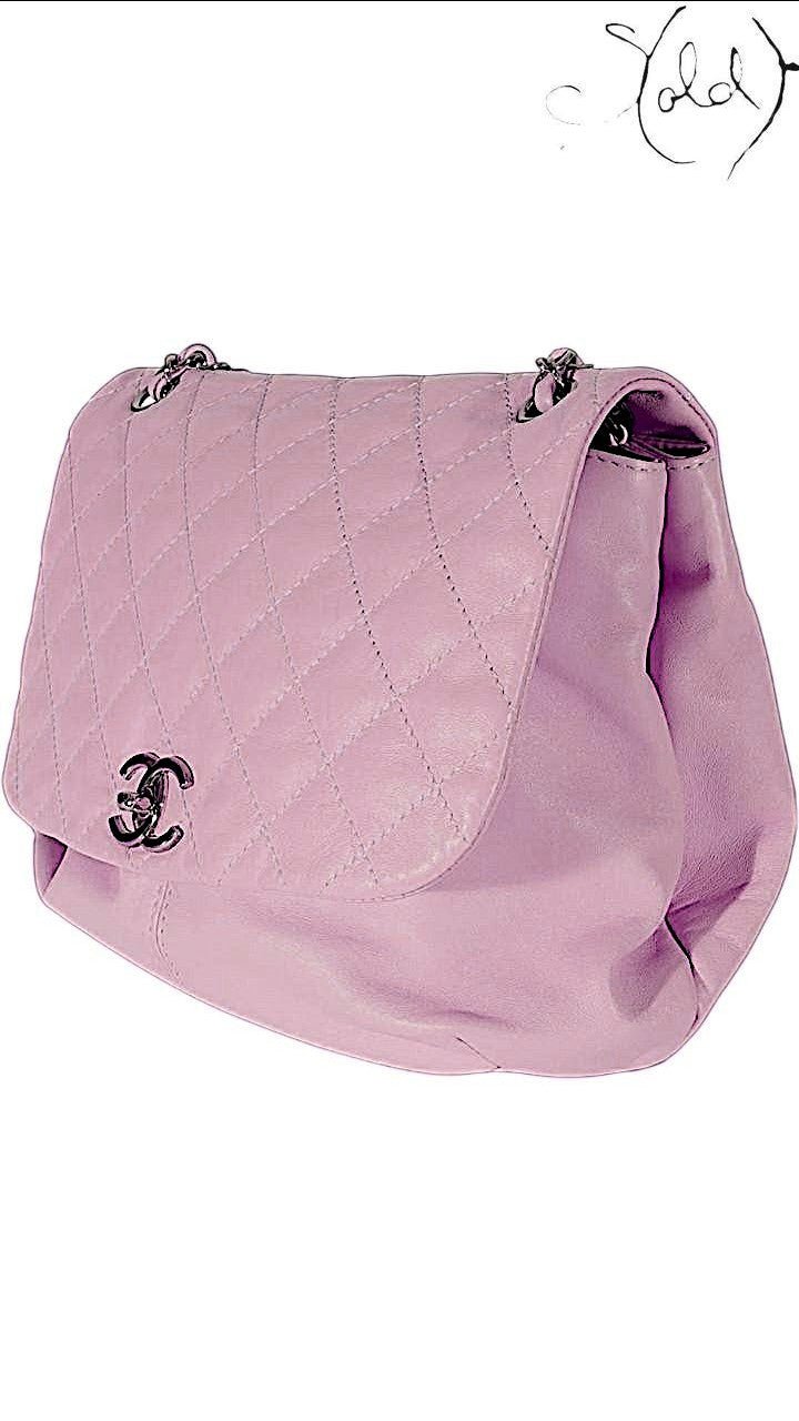 Sold Attire pastel purple lambskin Chanel Trianon messenger bag with diamond quilting and brushed gold-tone CC turn-lock closure.