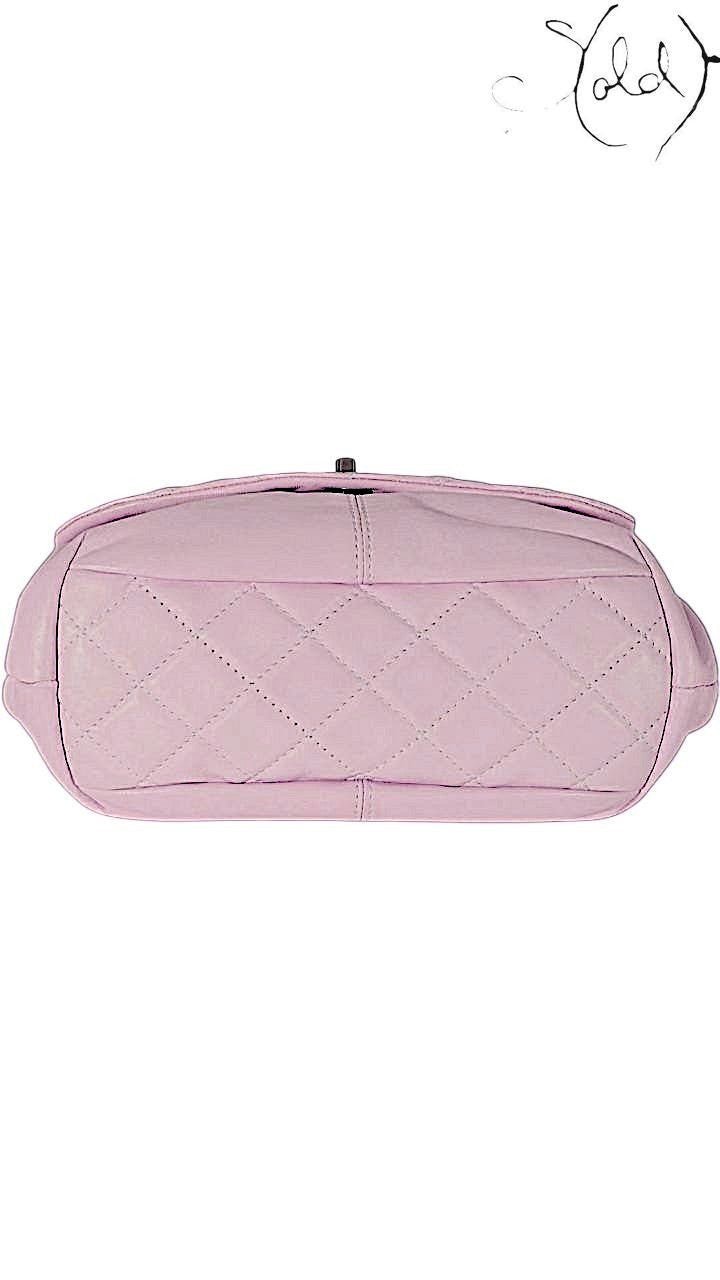 Sold Attire pastel purple lambskin Chanel Trianon Messenger large bag with diamond quilting and brushed gold-tone hardware.