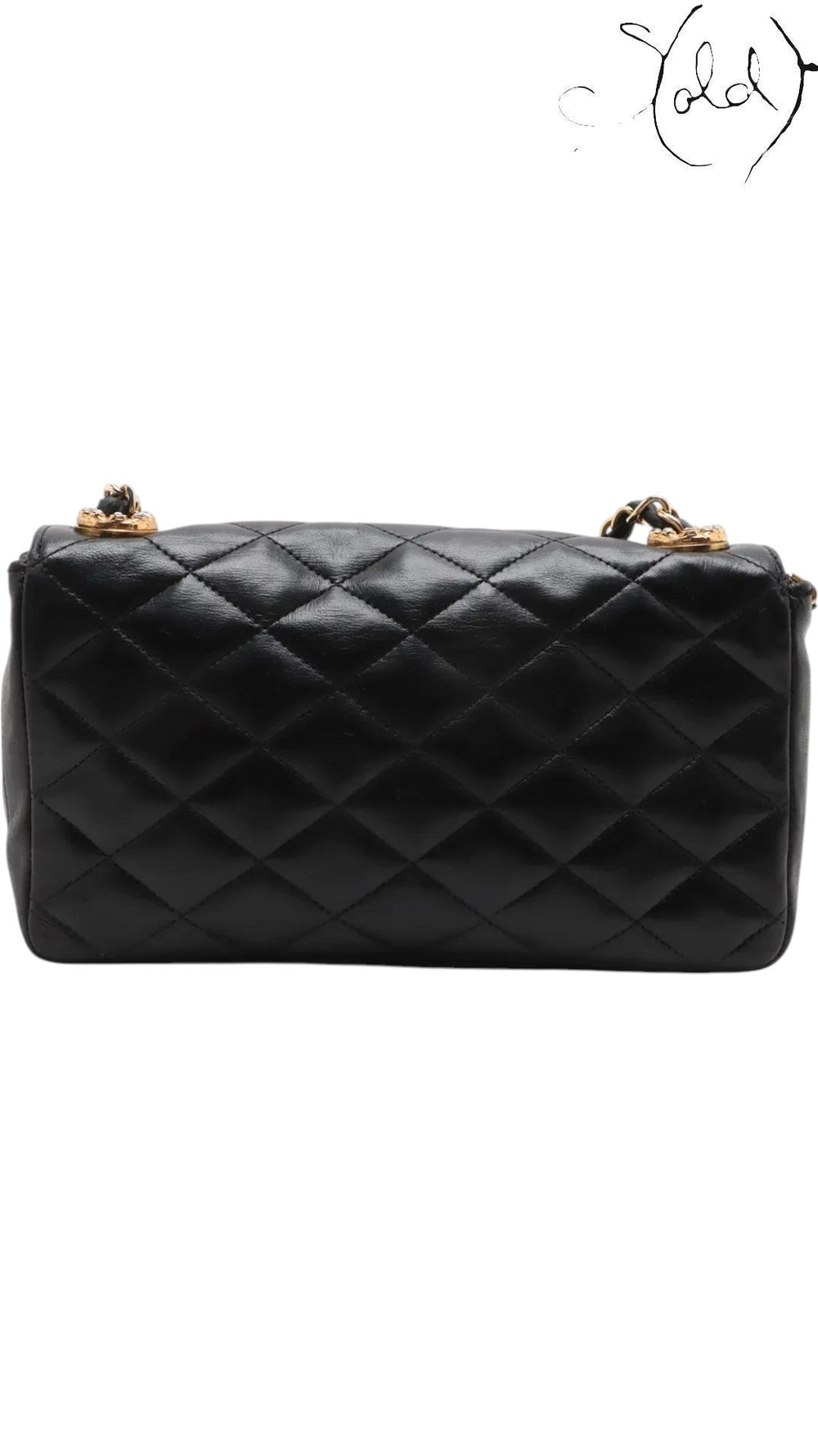 Sold Attire vintage Chanel single flap bag in black quilted lambskin leather with gold-tone chain strap