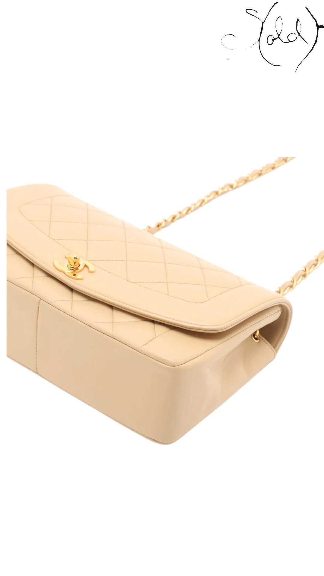 Sold Attire beige lambskin Chanel Diana medium bag with gold hardware and quilted stitching.