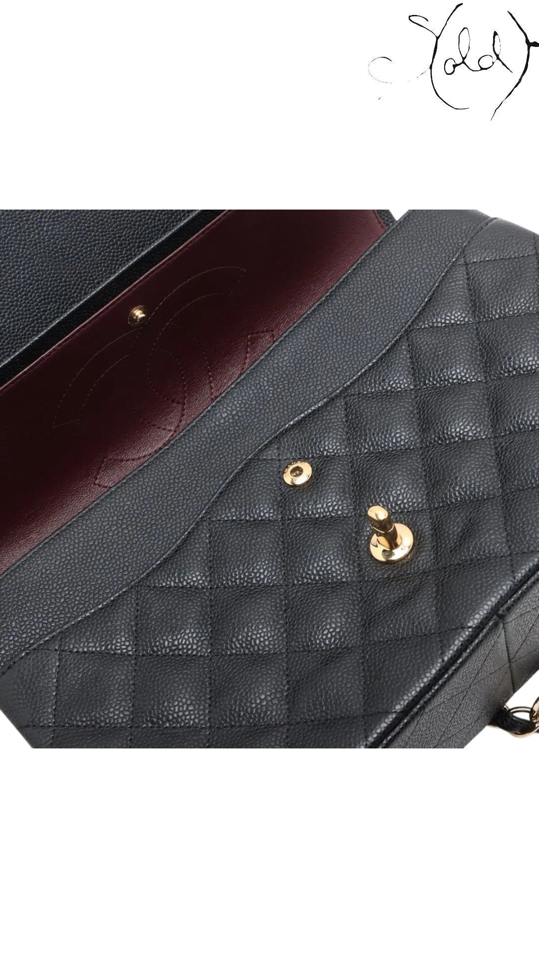 Sold Attire black caviar leather Chanel Jumbo Classic Double Flap bag with gold hardware and burgundy lining.