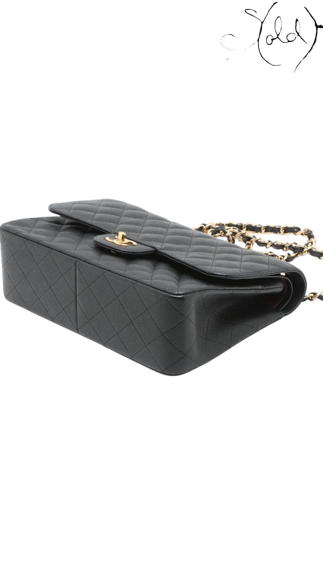 Sold Attire black caviar leather Chanel Jumbo Classic Double Flap bag with gold hardware and chain strap.
