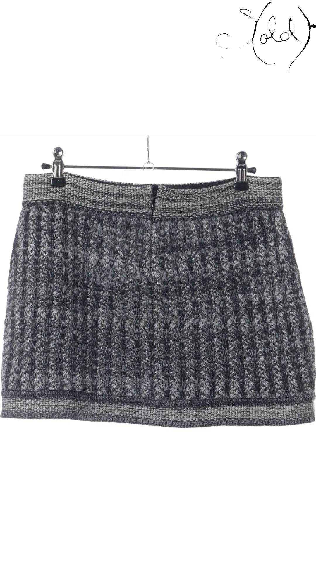 Sold Attire black and grey knit wool blend pencil skirt with a textured pattern and ribbed waistband.