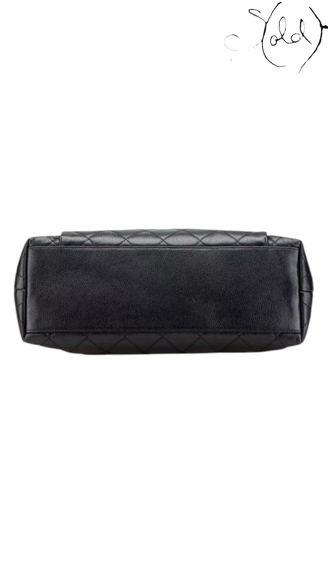 Sold Attire black quilted caviar leather Chanel CC tote with silver-tone hardware.