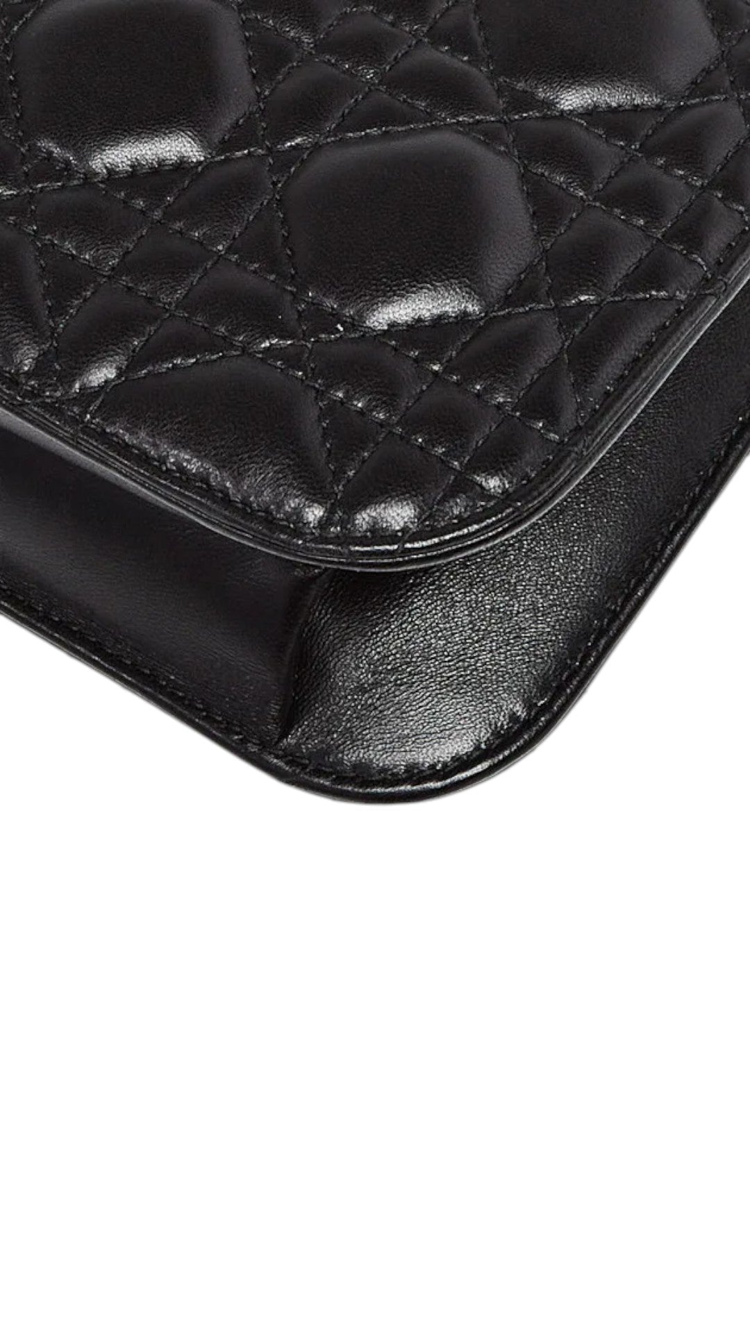 Sold Attire black lambskin Christian Dior Dioraddict flap bag with cannage quilting and aged gold hardware.