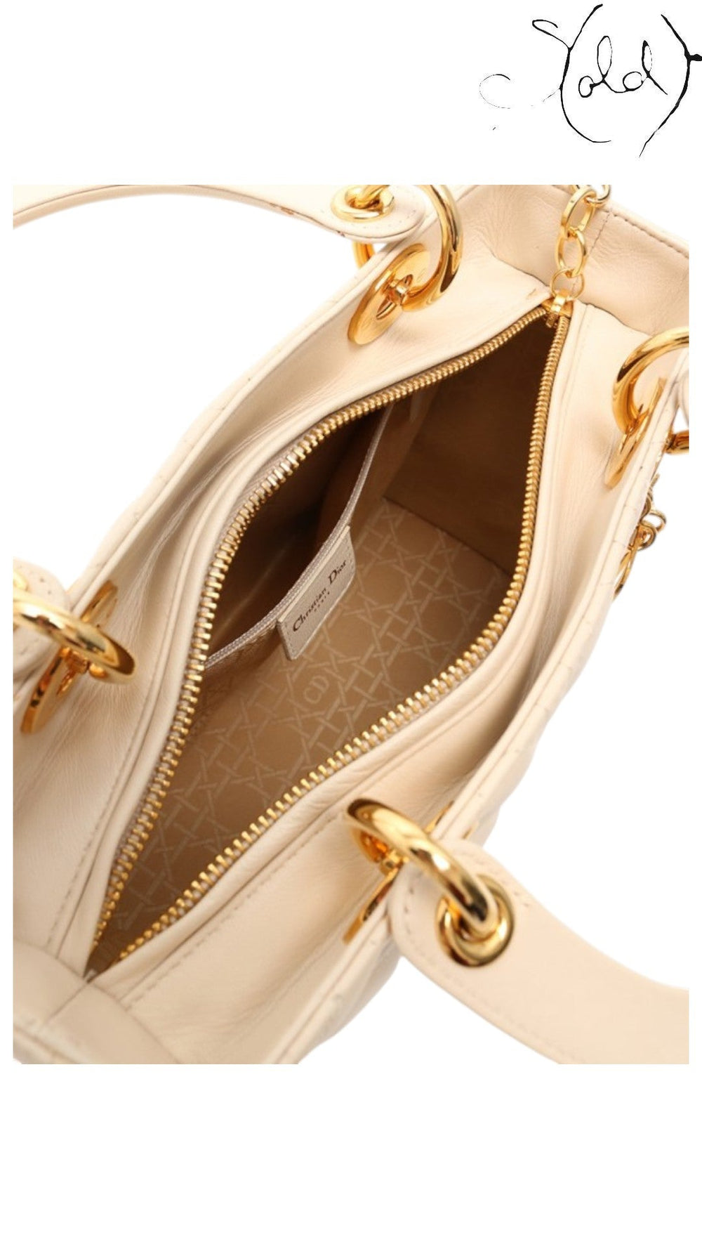 Sold Attire ivory Lady Dior handbag interior showing quilted Cannage leather, gold-tone hardware, and Dior branding.