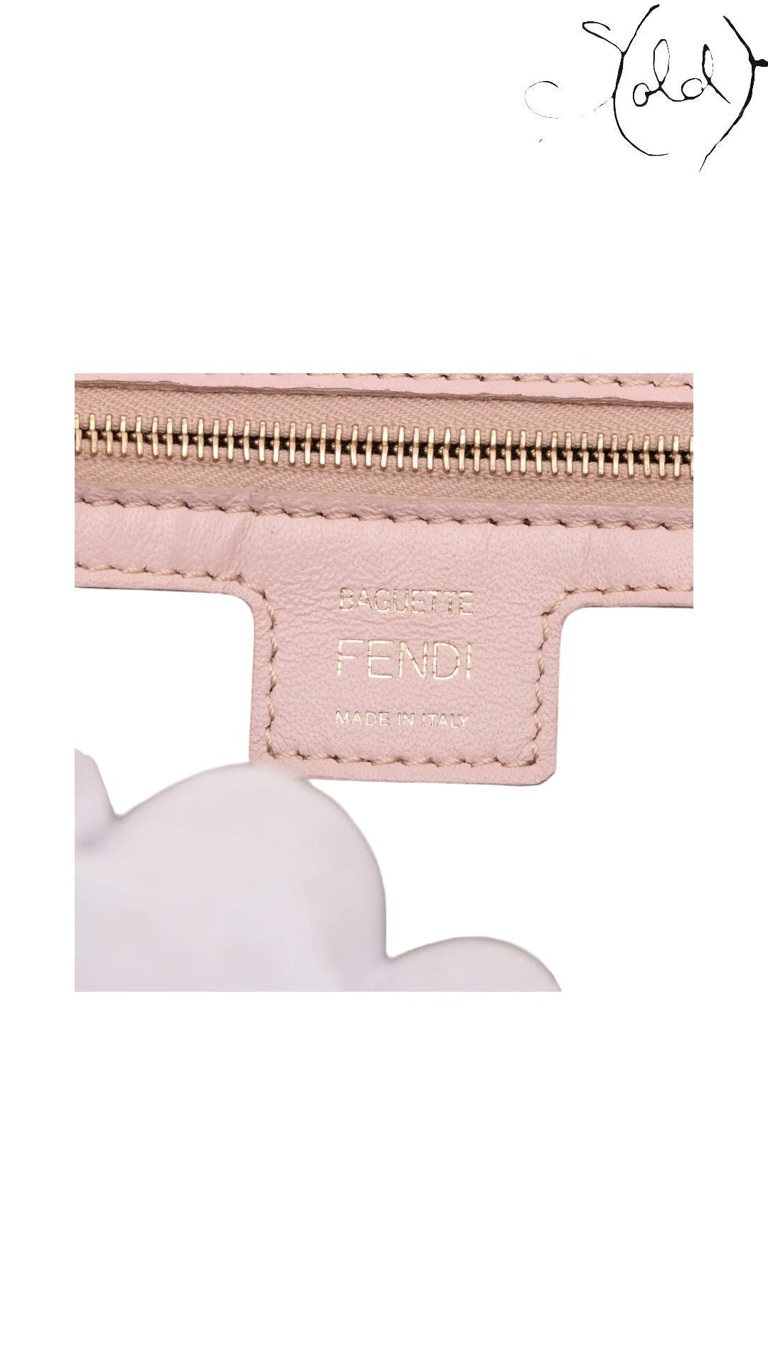 Sold Attire pink embossed calfskin Fendi Mamma Baguette with gold Fendi logo and Made in Italy stamp.