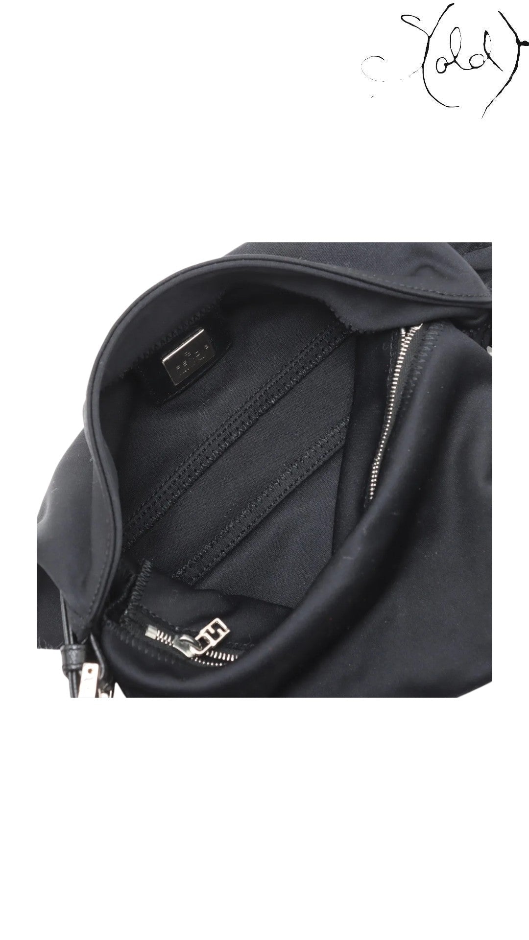 Sold Attire black Fendi Mamma Baguette shoulder bag in jersey with leather trim and gold-tone FF logo.