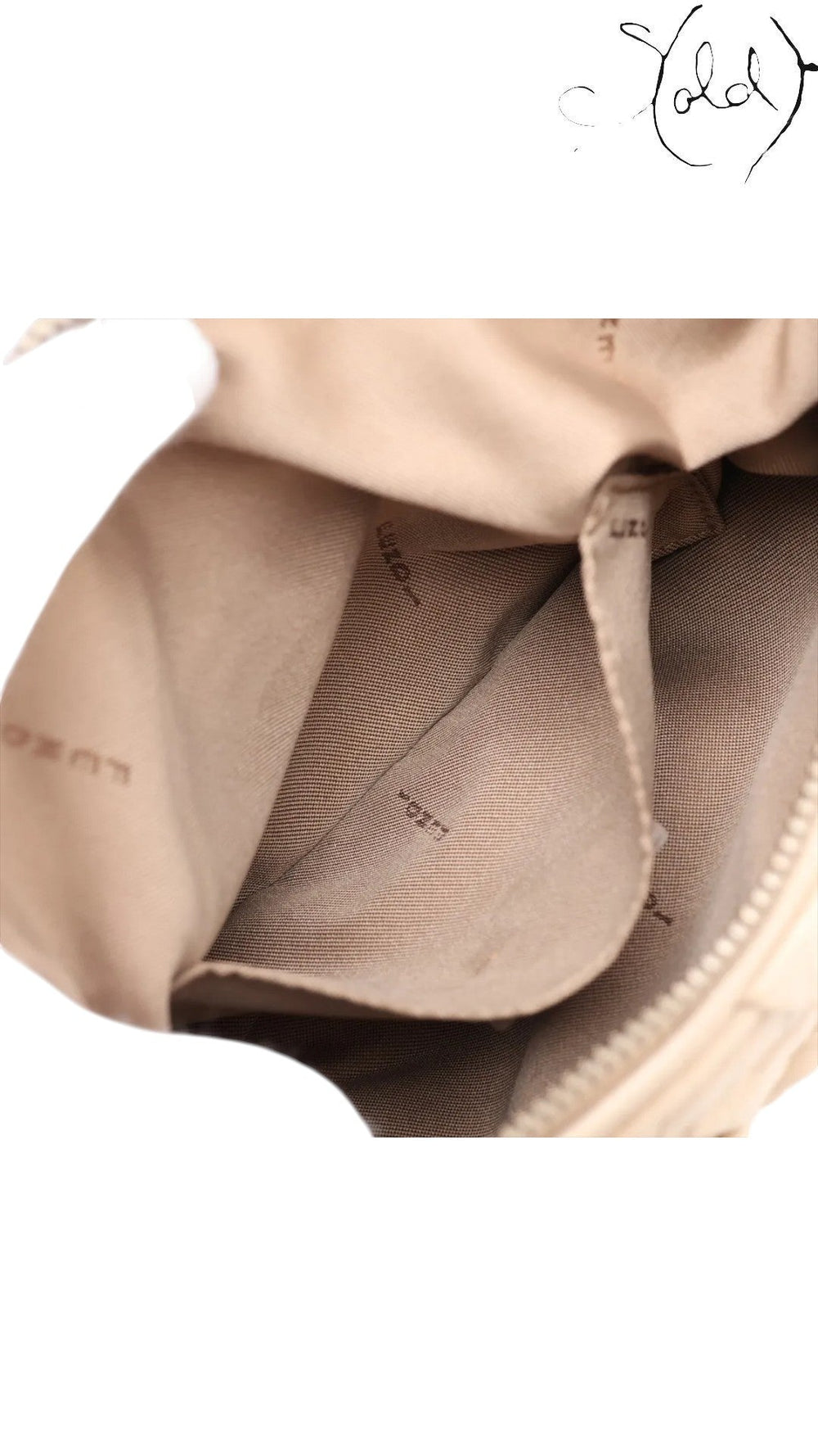 Sold Attire beige leather Fendi Knot shoulder bag with jacquard lining and gold-tone zipper.