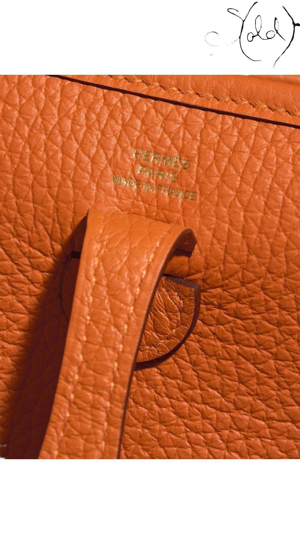 HERMÈS Évelyne TPM 16 – Orange Clemence, Hardware detail | Sold Attire