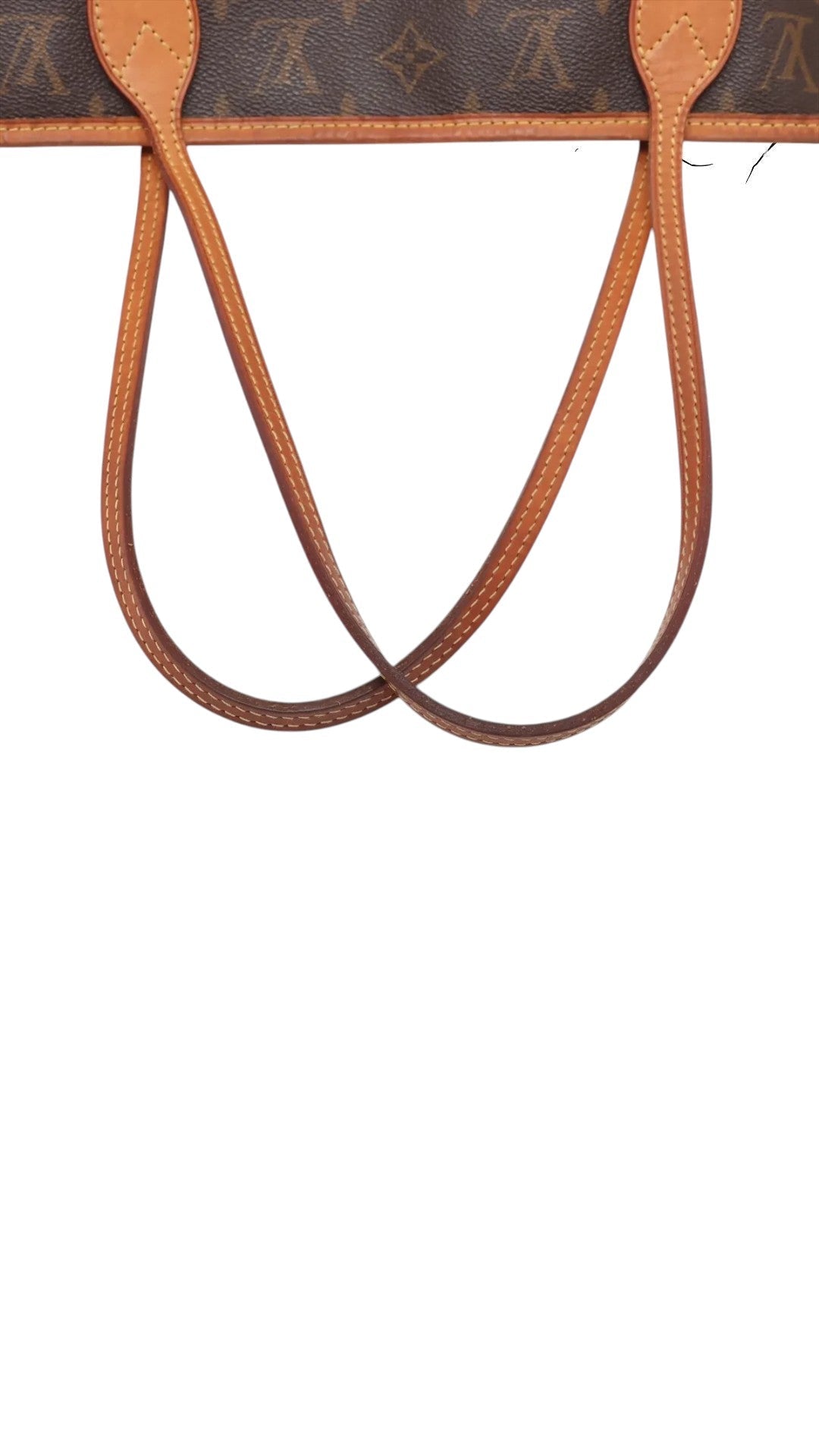 Sold Attire Louis Vuitton Monogram Neverfull MM brown coated canvas tote with vachetta leather trim and handles.