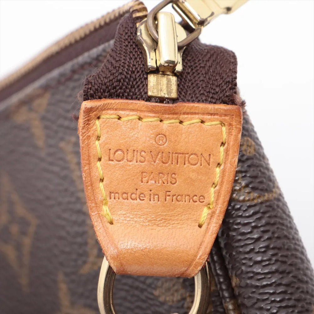 Louis Vuitton Monogram Pochette Accessoires M51980 CA0040 — Authenticated Pre-Owned | Sold Attire