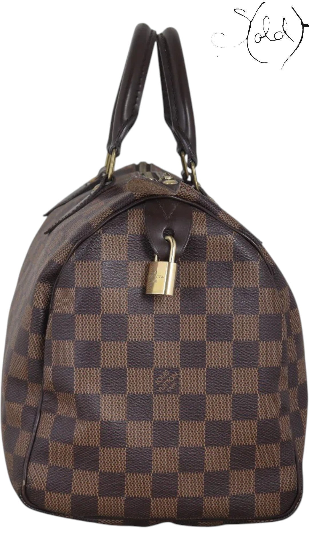 Sold Attire brown Damier Ebene coated canvas Louis Vuitton Speedy 30 bag with leather trim and brass hardware.