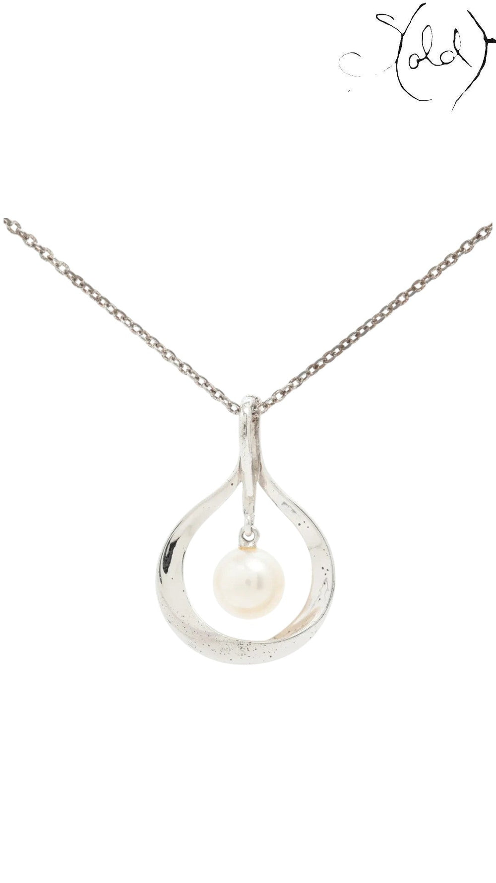 Sold Attire vintage Mikimoto sterling silver pendant necklace featuring a cream cultured pearl in a teardrop frame.