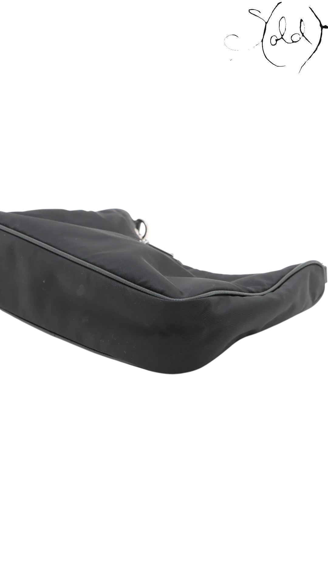 Sold Attire black Prada Re-Edition 2005 nylon shoulder bag with Saffiano leather trim and silver hardware.