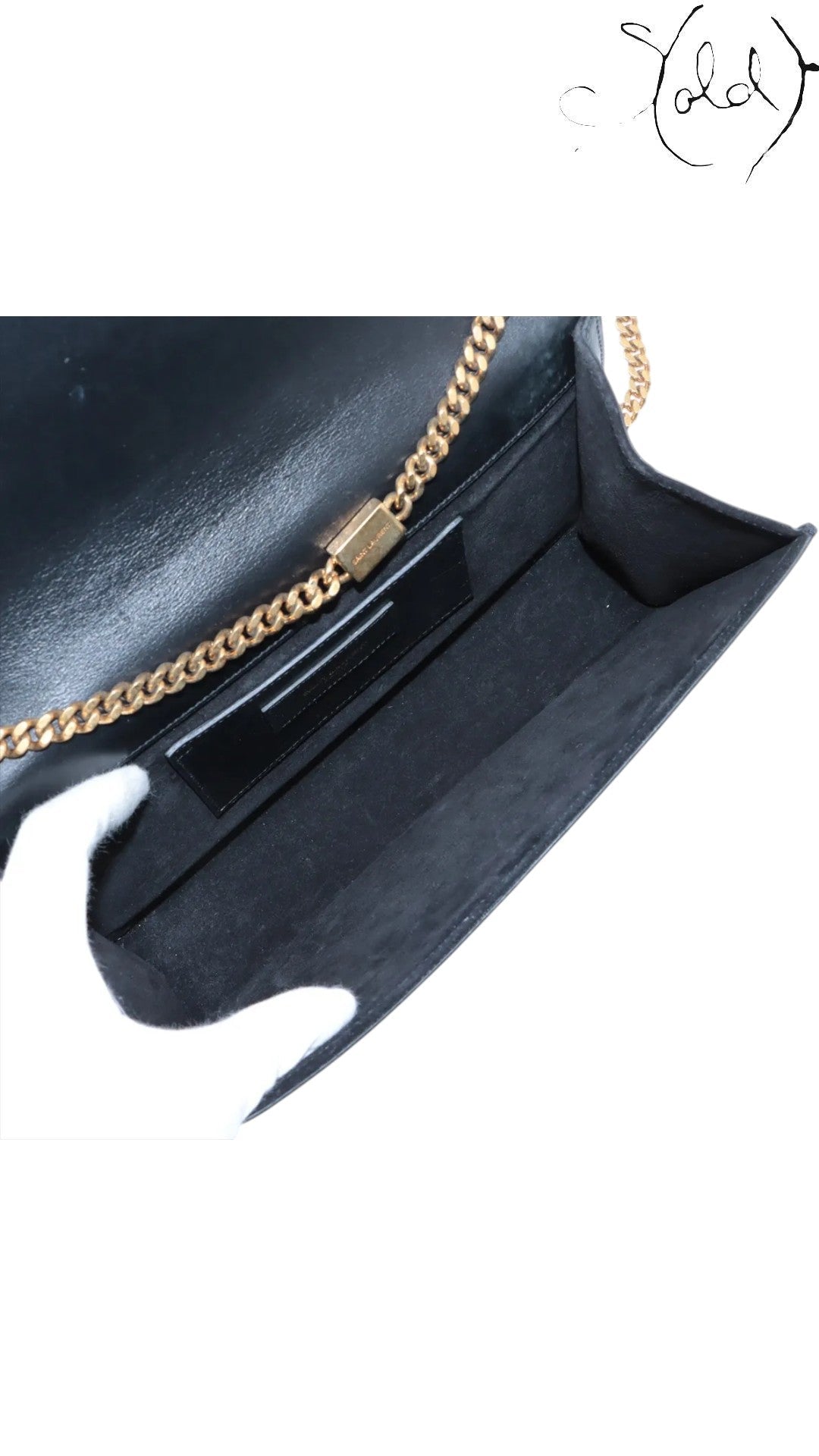 Sold Attire black leather Saint Laurent Kate tassel crossbody bag with gold chain detail and interior pocket.