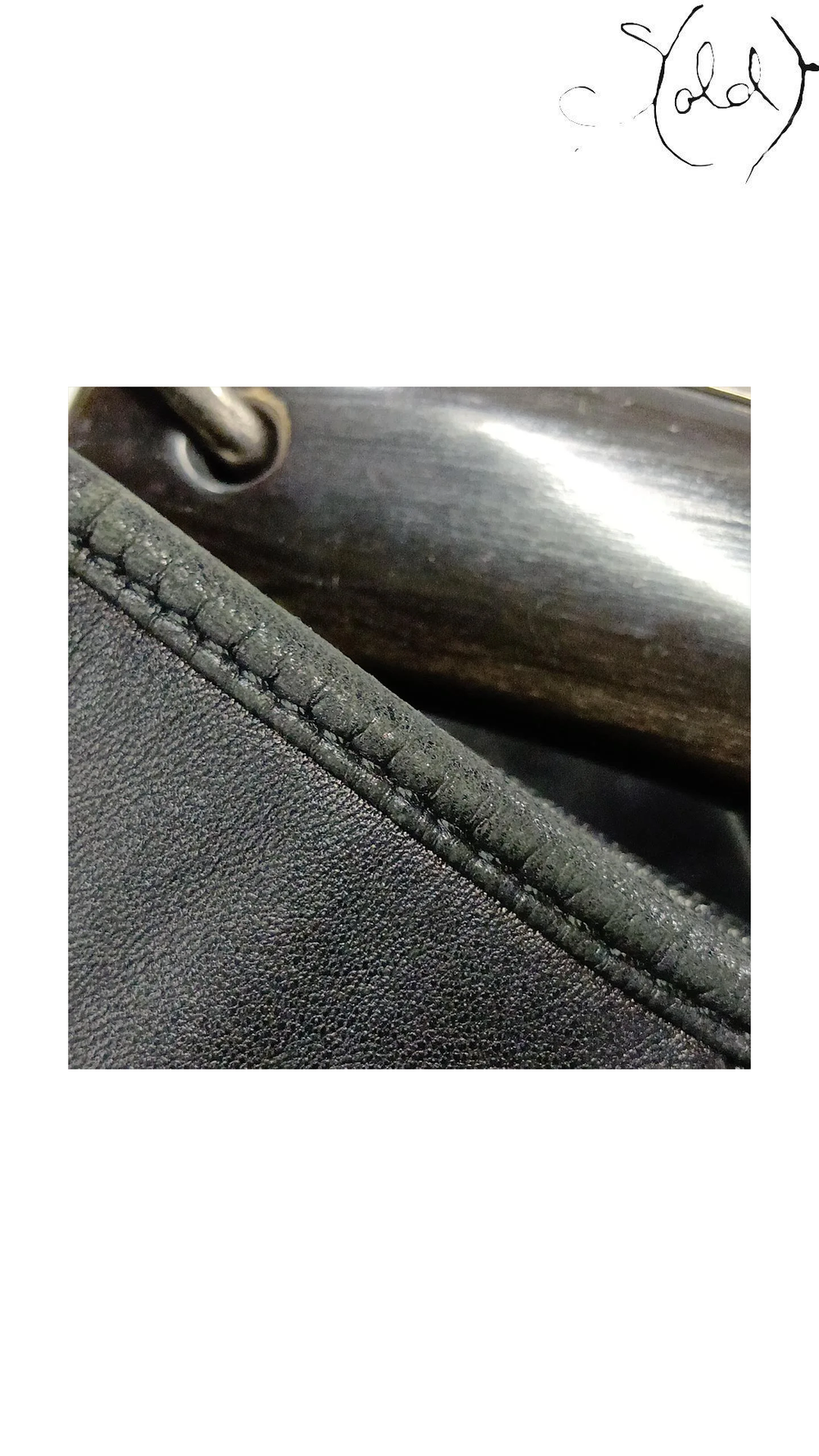 Saint Laurent Mombasa Black Leather Horn Shoulder Bag, handle surface detail