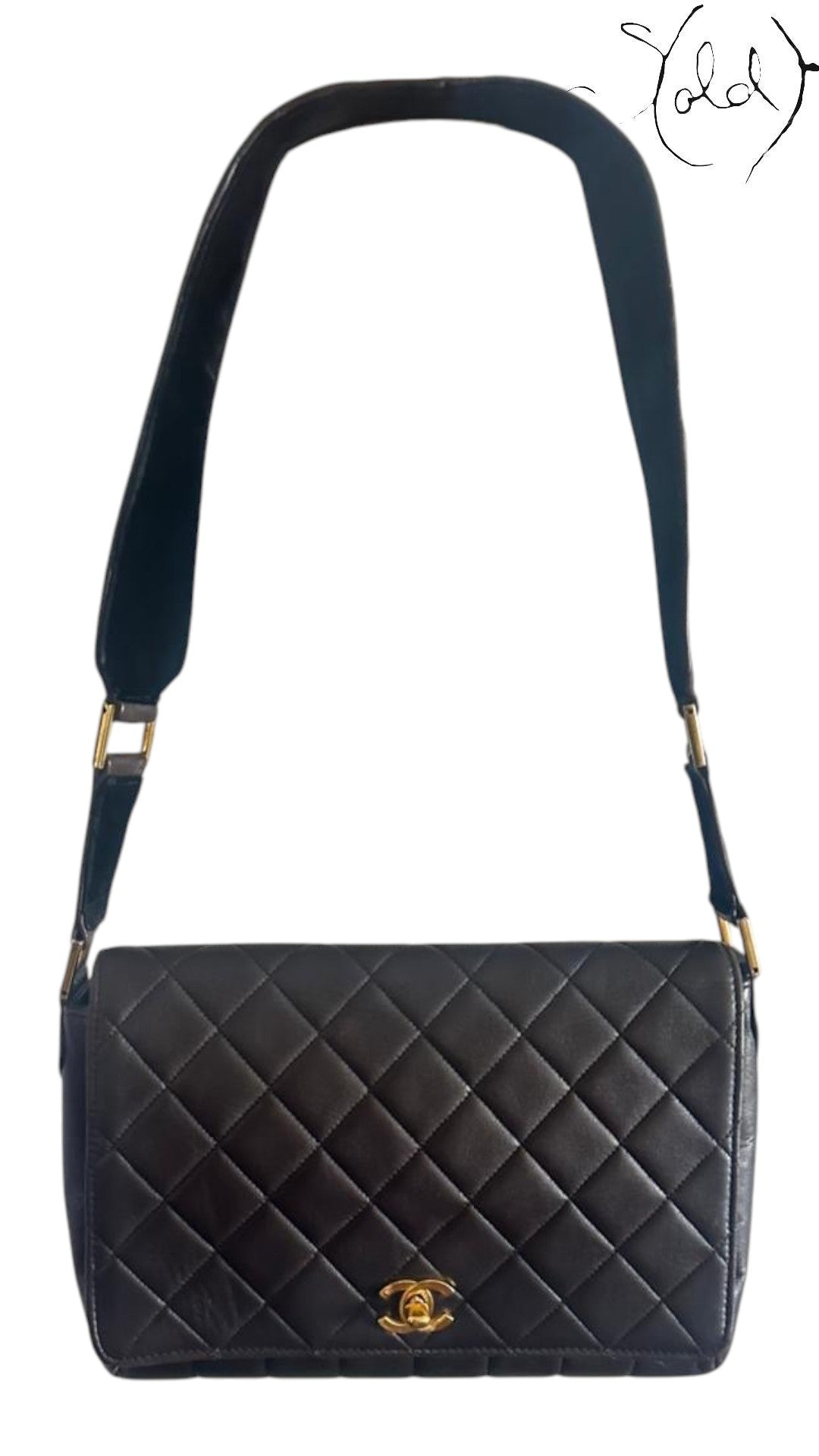 Sold Attire chocolate brown quilted lambskin Chanel Classique Single Full Flap bag with 24k gold CC turn-lock and suede strap.