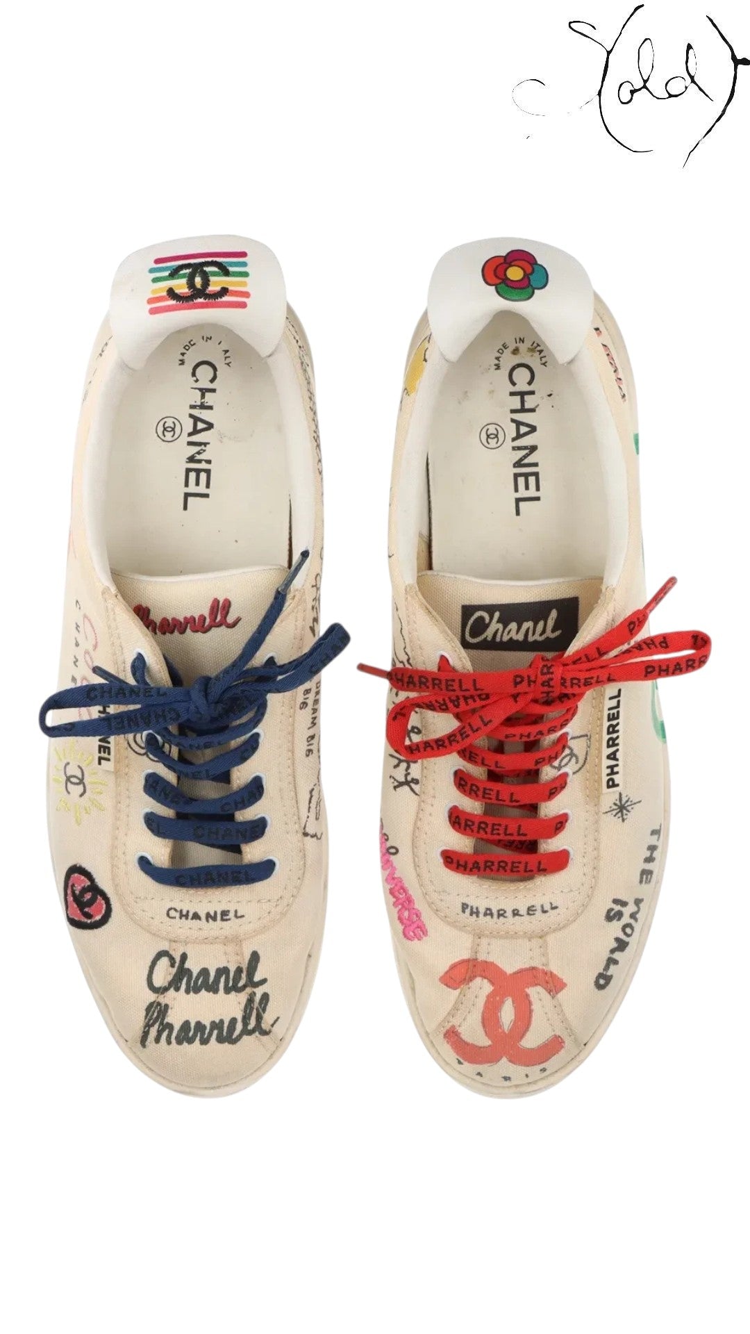 Sold Attire Chanel x Pharrell low-top sneakers in white canvas with multicolor graphic prints and mismatched laces.