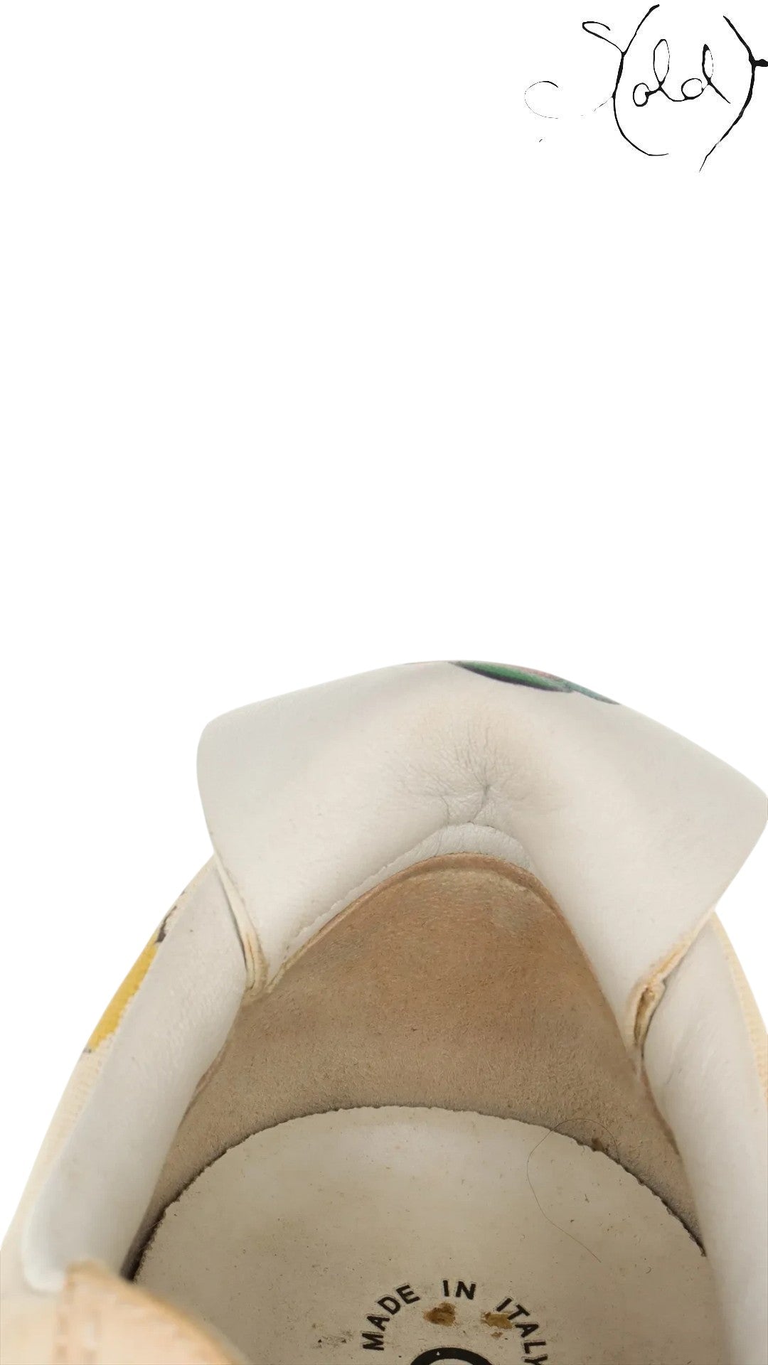 Sold Attire Chanel x Pharrell Coco sneakers featuring white canvas, multicolor details, and leather interior lining.