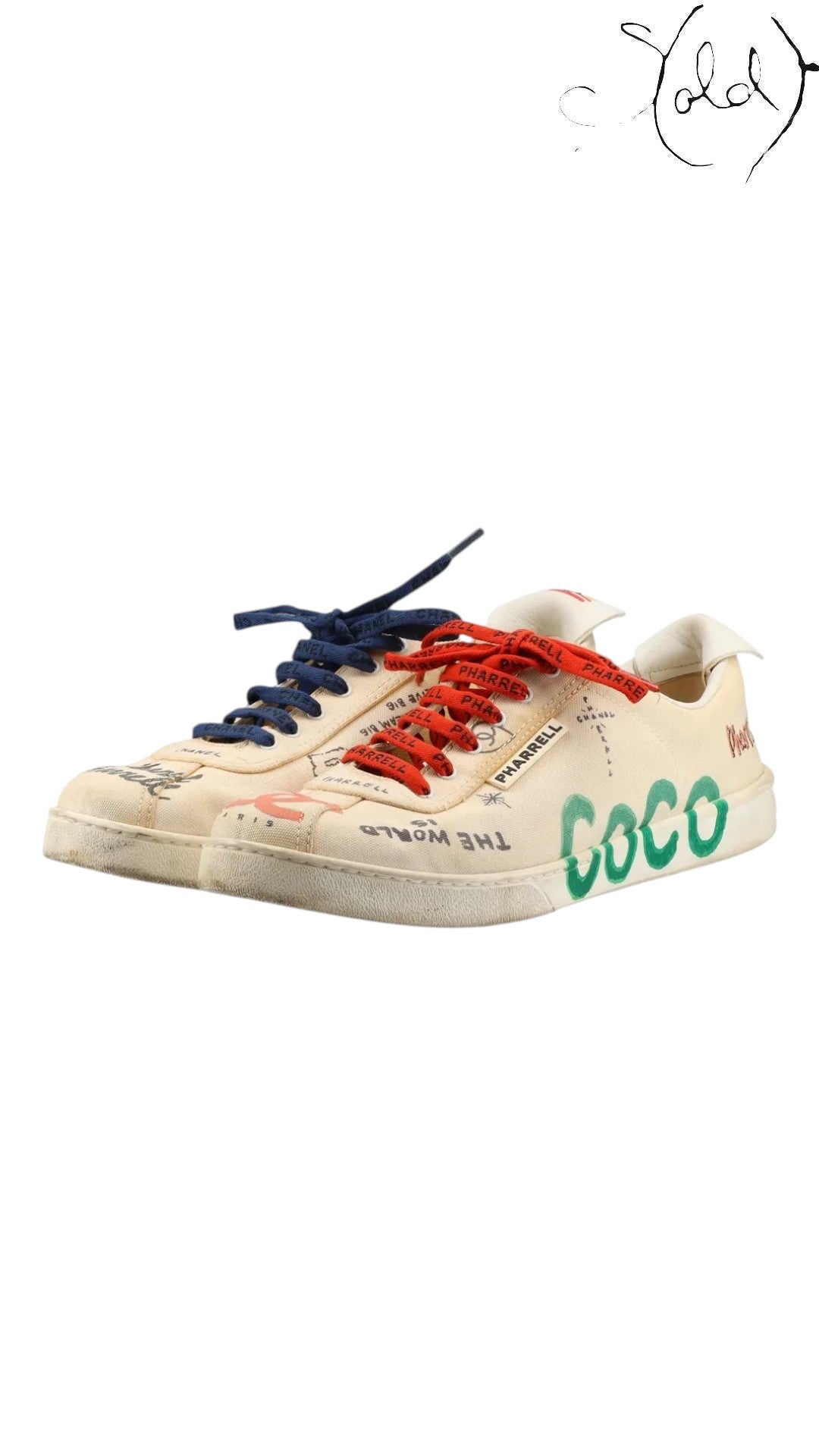 Sold Attire Chanel x Pharrell low-top canvas sneakers in white with multicolor COCO print and mismatched laces.