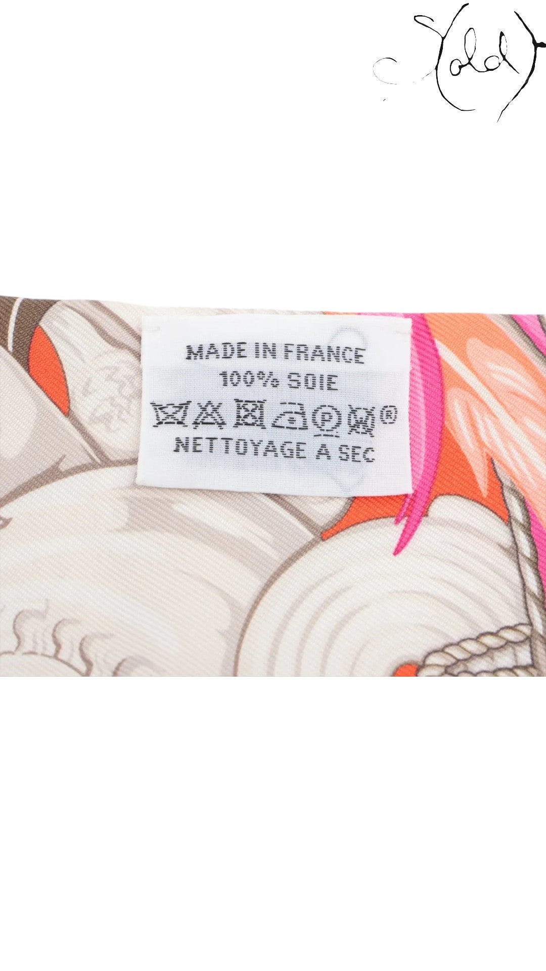Sold Attire Hermes Twilly Danse Pacifique silk scarf care label showing 100% silk and Made in France details.