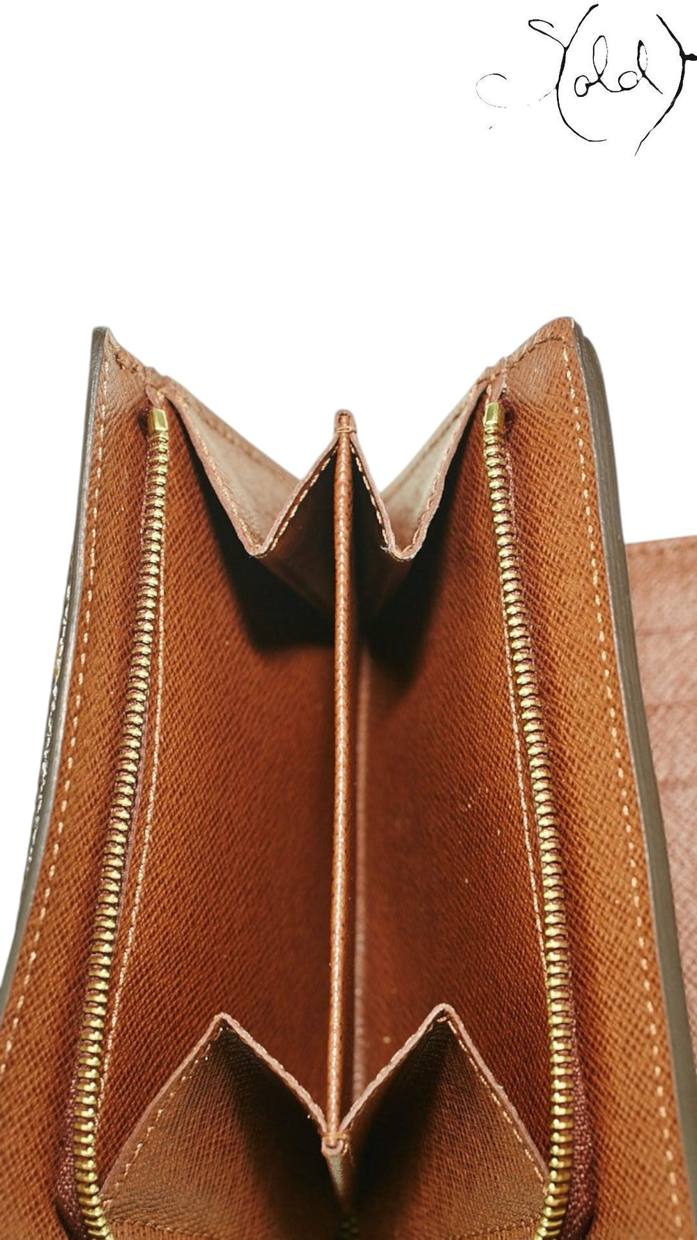 Sold Attire Louis Vuitton Joey wallet interior showing brown cross-grain leather lining, gold-tone zippers, and compartments