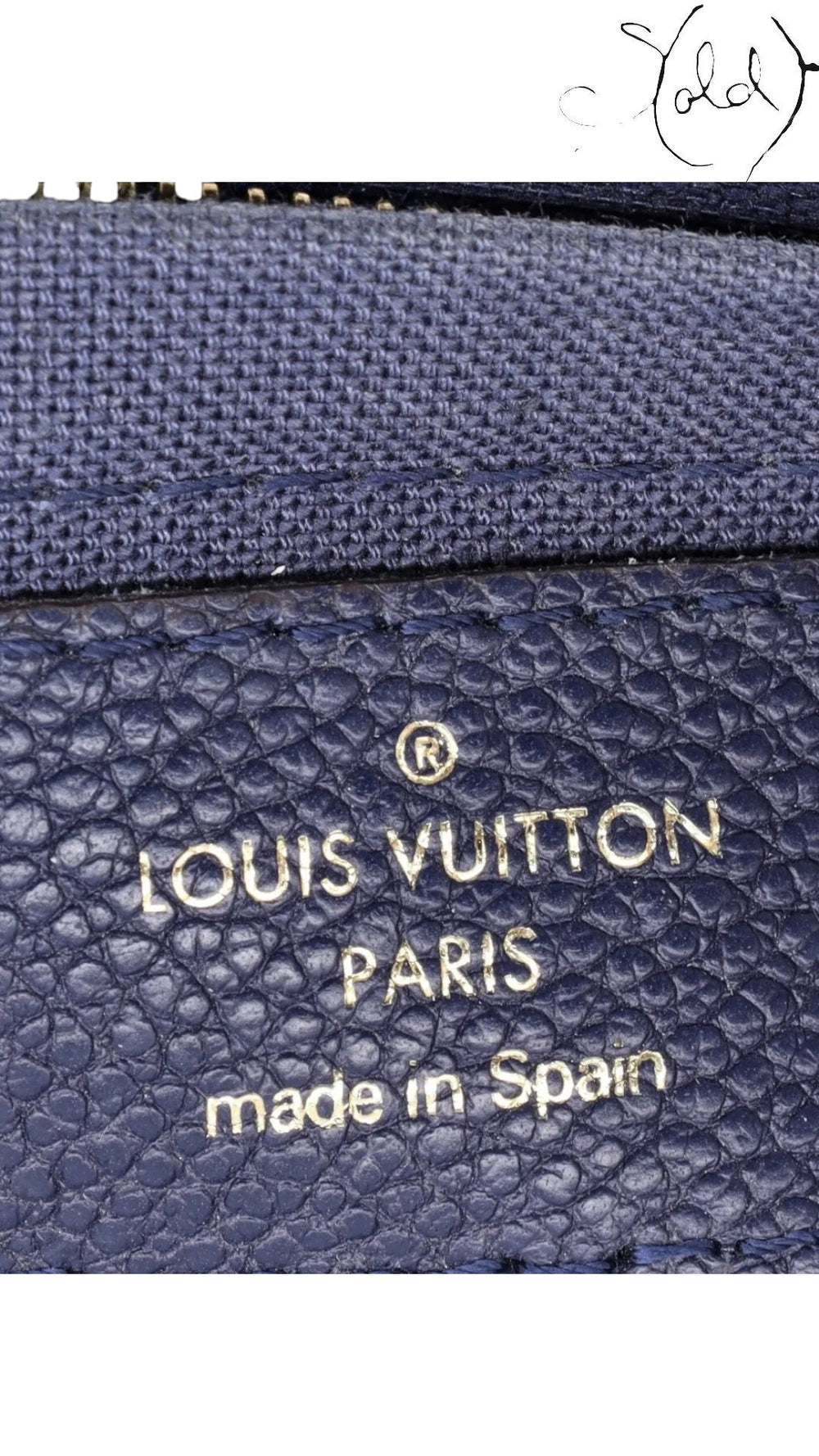 Sold Attire Louis Vuitton Pallas Clutch interior heat stamp on blue marine leather with Made in Spain engraving