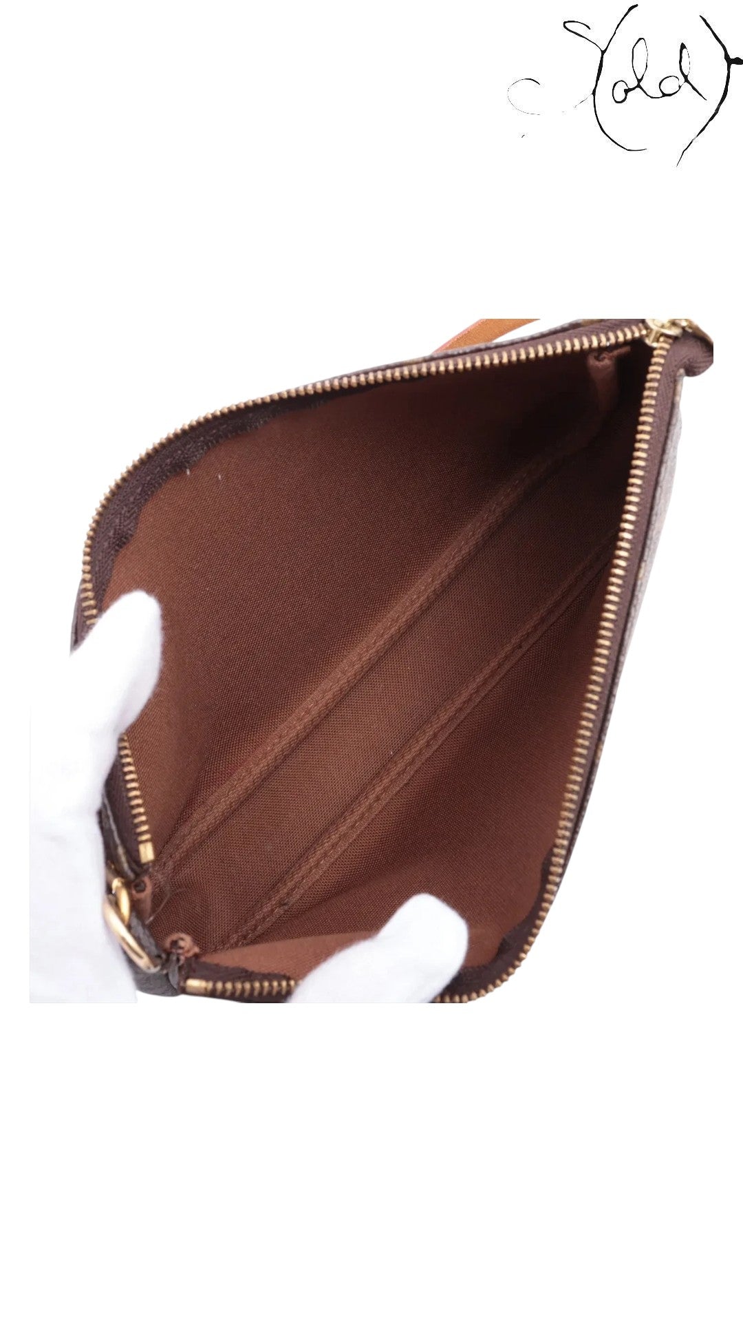 Interior view of a pre-owned Louis Vuitton Pochette Accessoires M51980 with brown textile lining, sold by Sold Attire.