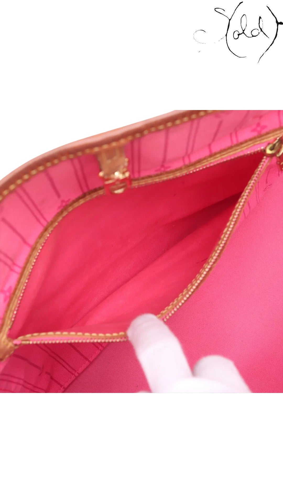 Sold Attire Louis Vuitton Stephen Sprouse Roses Neverfull MM interior with pink lining and gold-tone zipper.