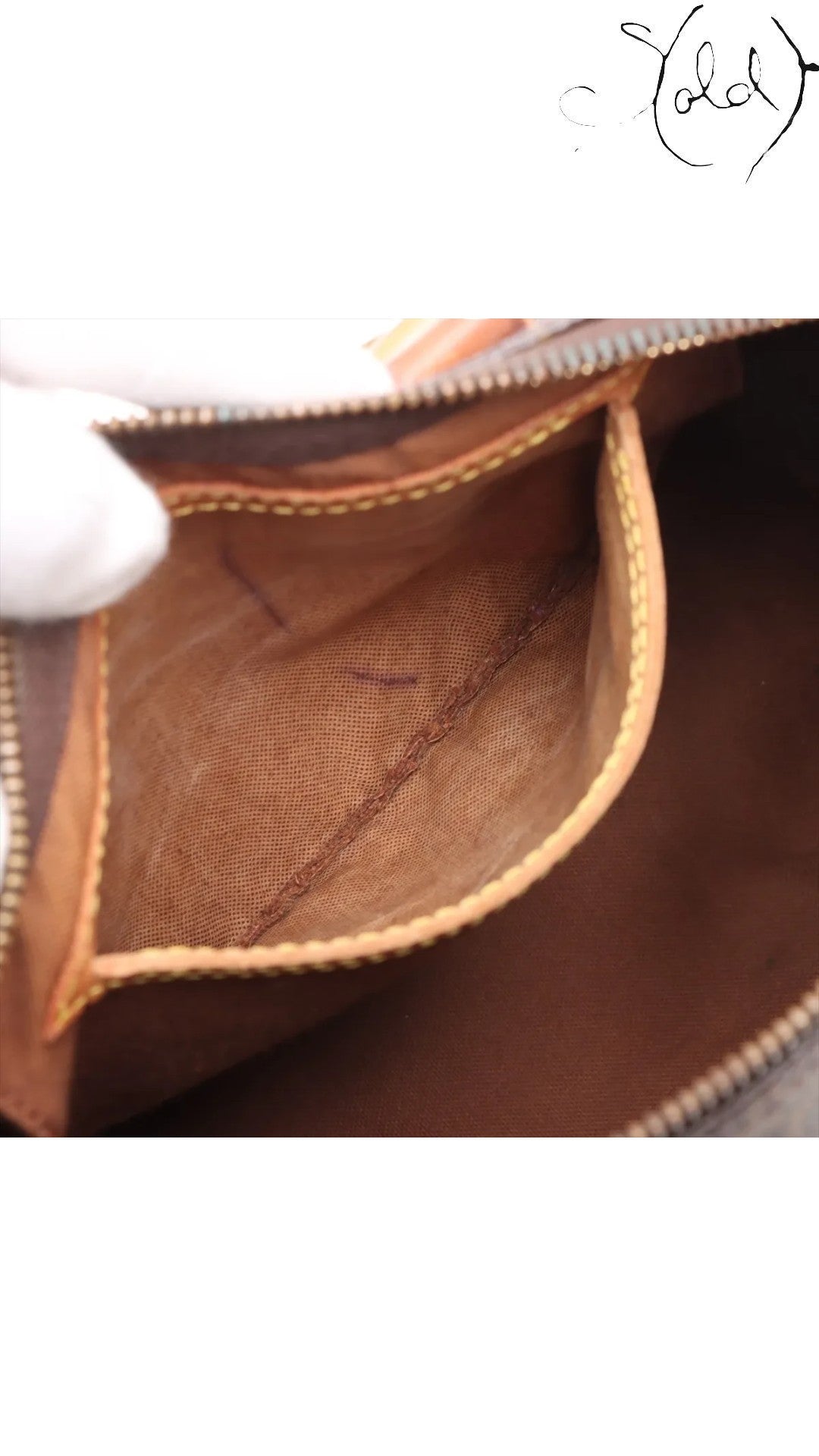 Sold Attire brown Louis Vuitton Monogram Speedy 25 interior with canvas lining and leather trim.