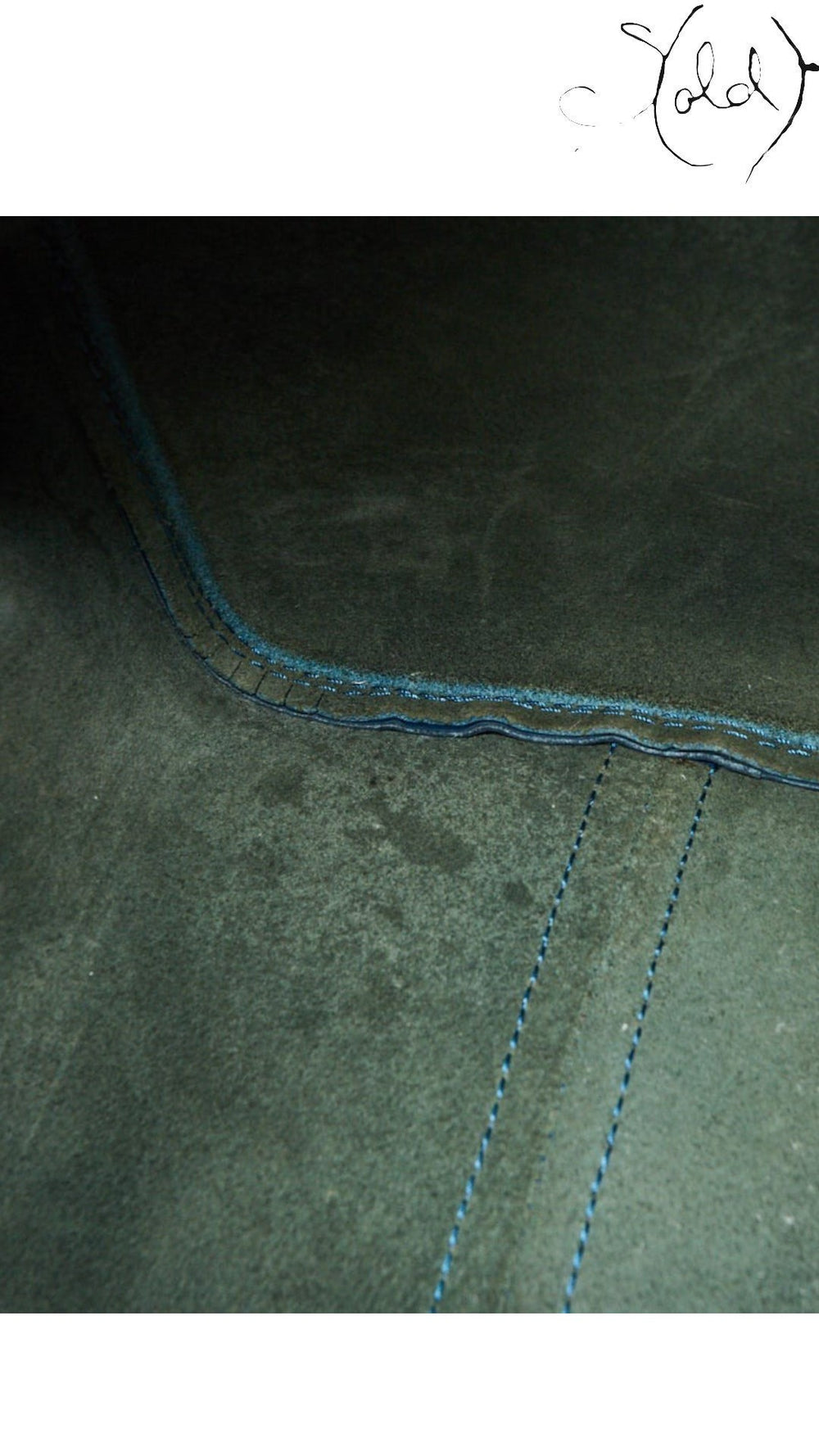 Sold Attire interior view of a vintage Louis Vuitton Speedy 30 bag featuring smooth blue leather lining and stitching.