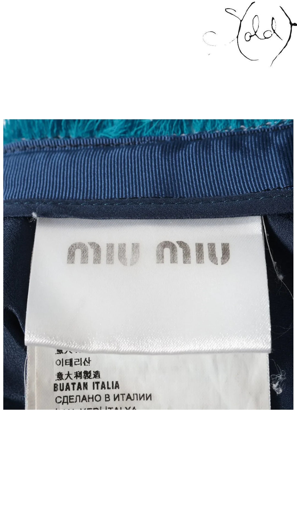 Sold Attire Miu Miu blue wool and polyester skirt interior label and garment construction detail