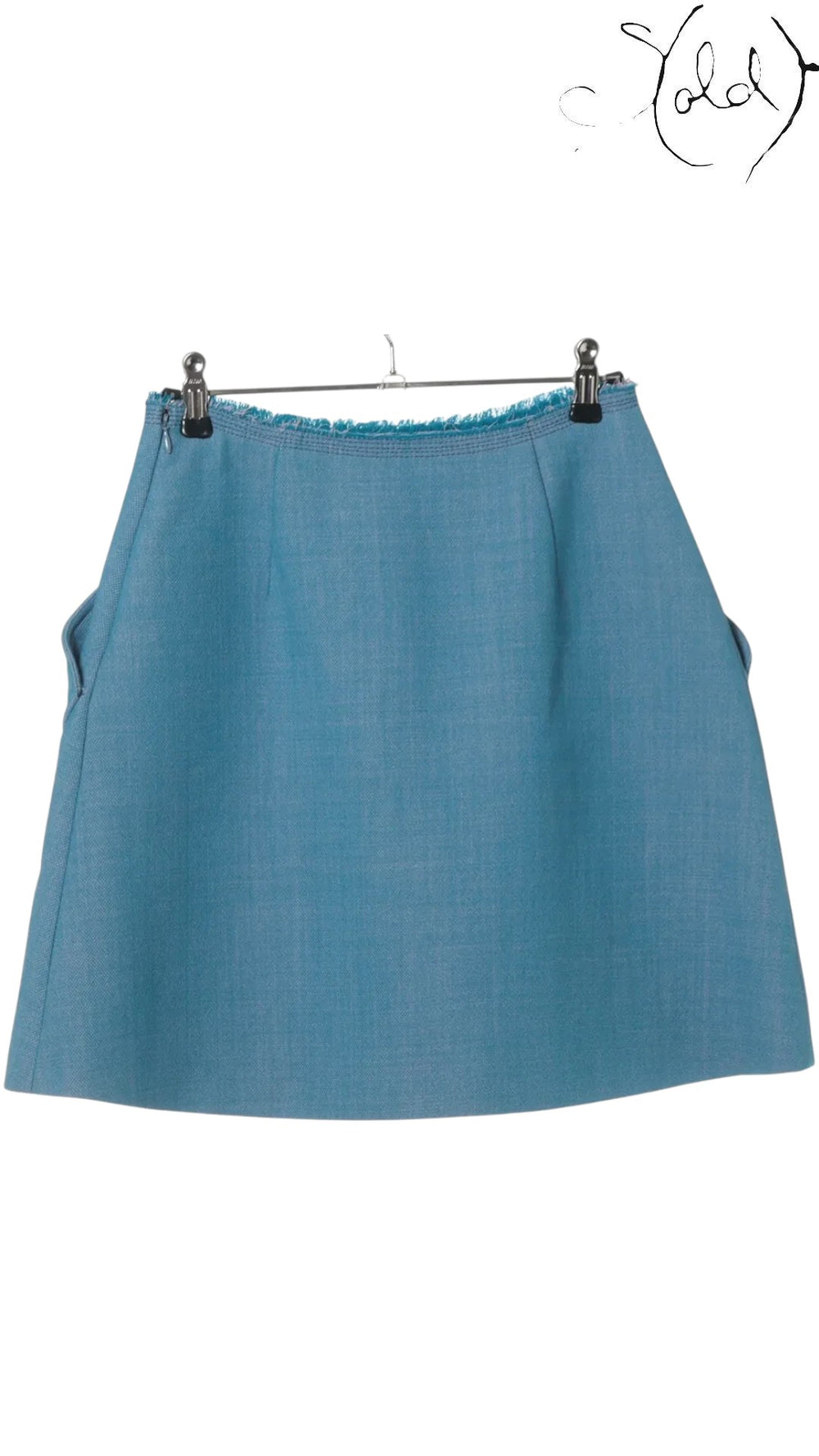 Sold Attire blue Miu Miu wool and polyester flared mini skirt with front pockets and frayed waist detail