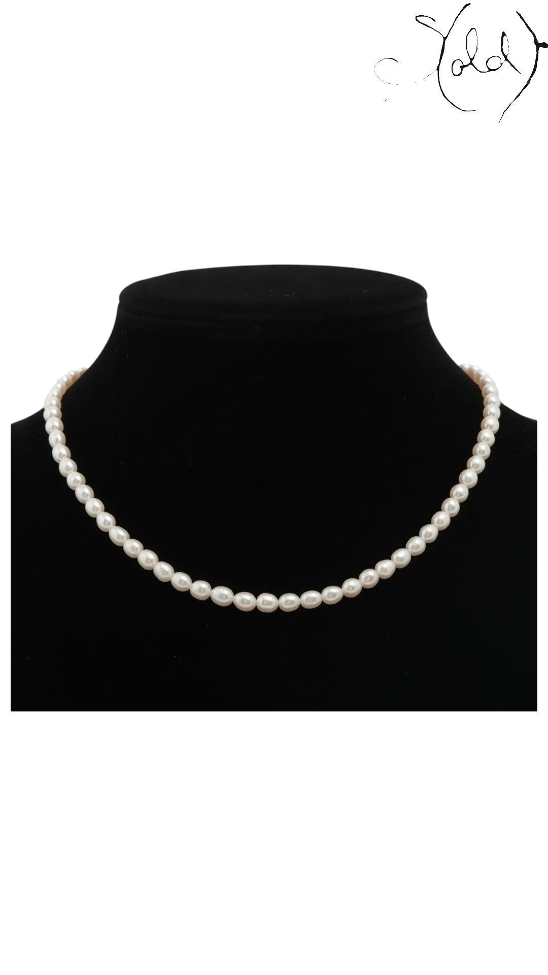 Sold Attire pre-owned TASAKI single-strand cream pearl necklace with SV silver clasp on a black display bust