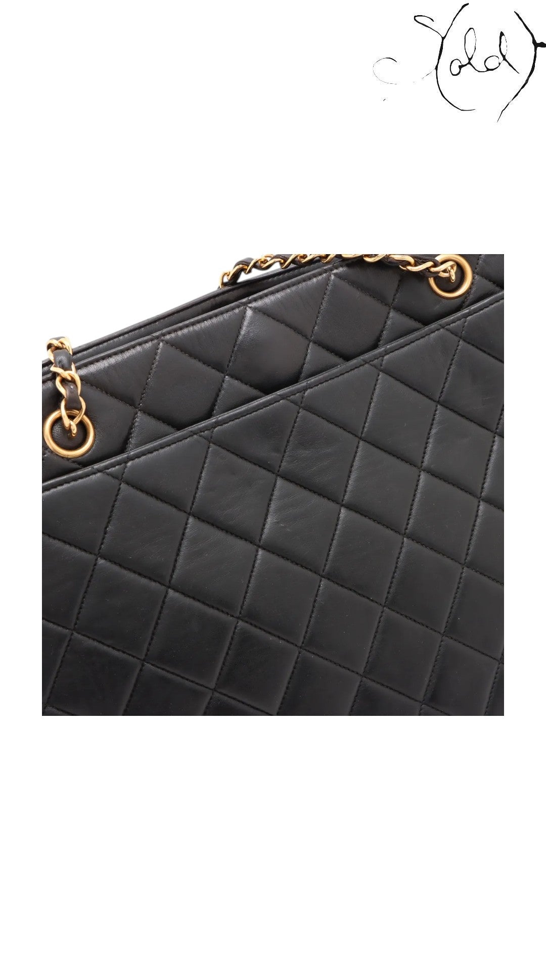 Sold Attire black quilted lambskin Chanel CC Turn-Lock chain tote with gold hardware.