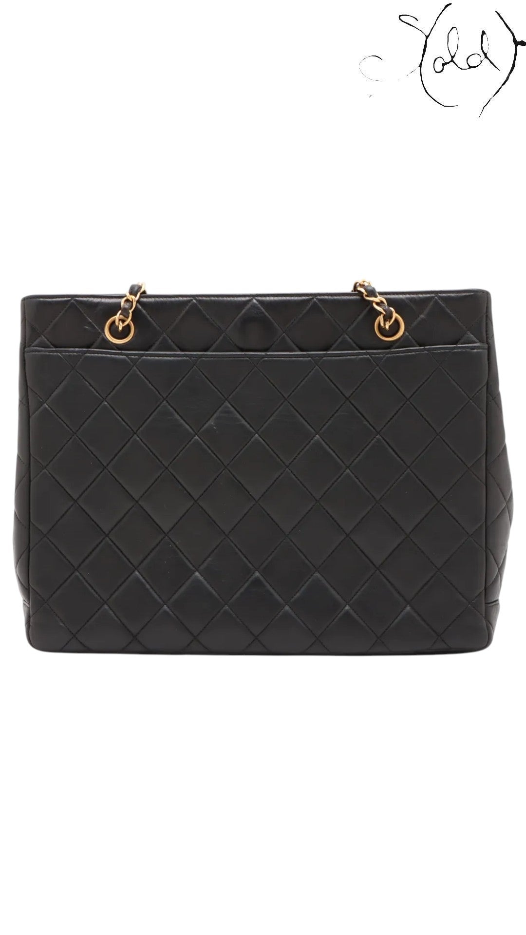 Sold Attire black quilted lambskin Chanel CC Turn-Lock chain tote with gold hardware and chain straps.