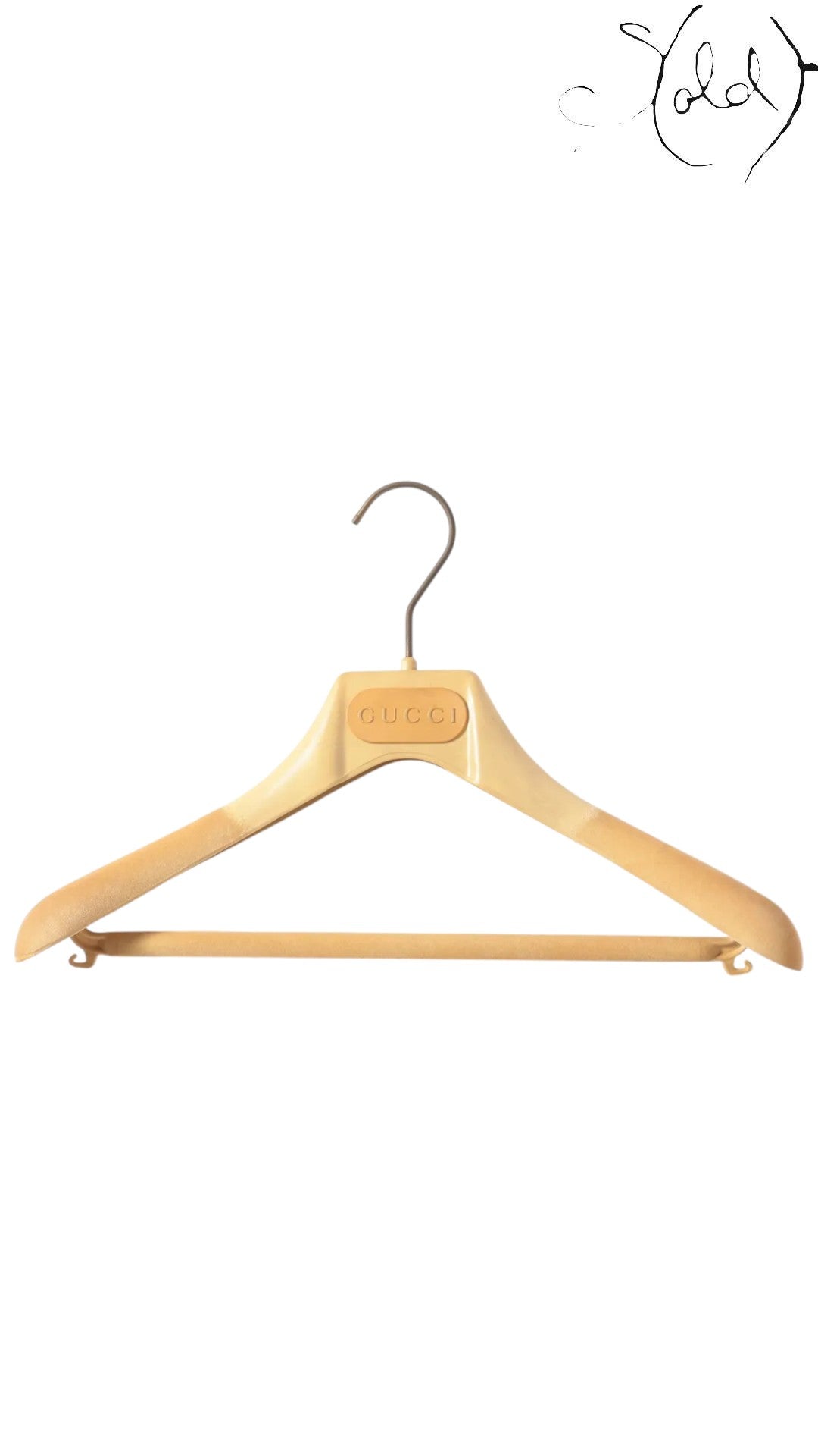 Sold Attire Gucci Tom Ford era archival beige plastic hanger with velvet shoulder grips and metal hook.