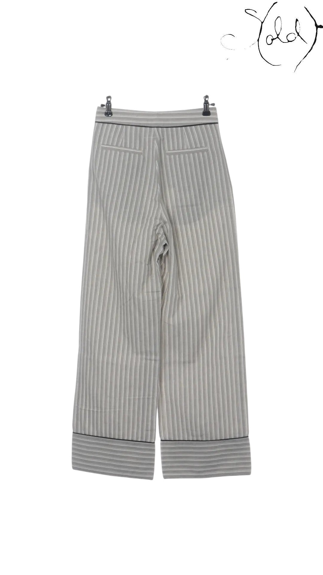 Sold Attire MM6 Maison Margiela gray and white striped wide-leg cotton pants with black trim.